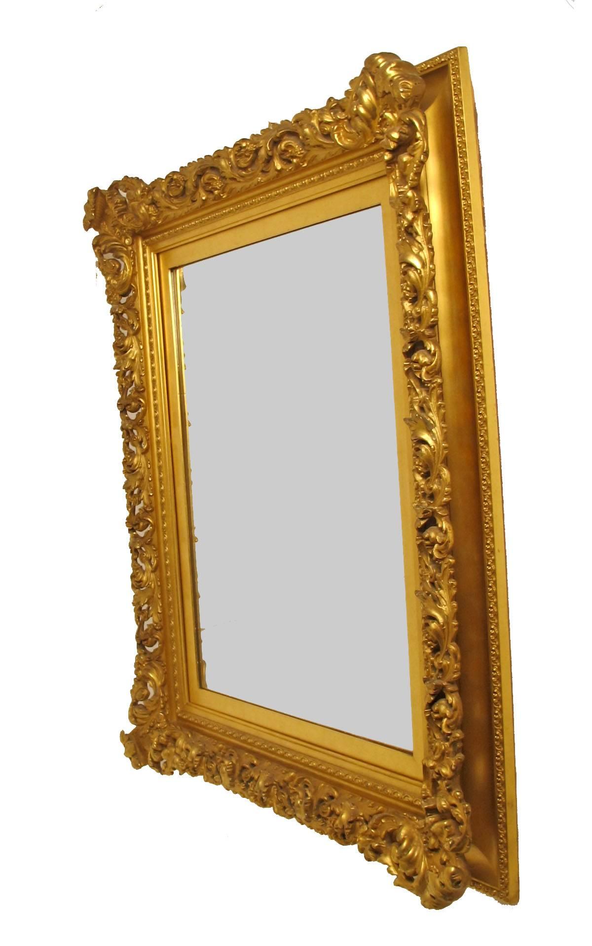 A very fine quality mercury gilded portrait frame now converted to a mirror. Beautiful antique condition. American, late 19th century.