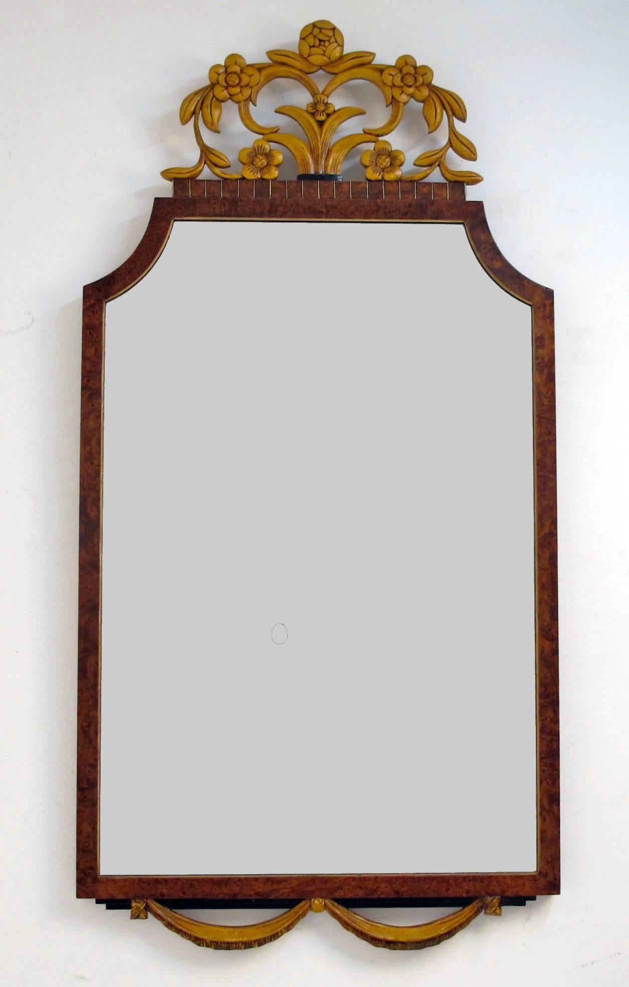 Carved and painted walnut mirror, American, 1920s.