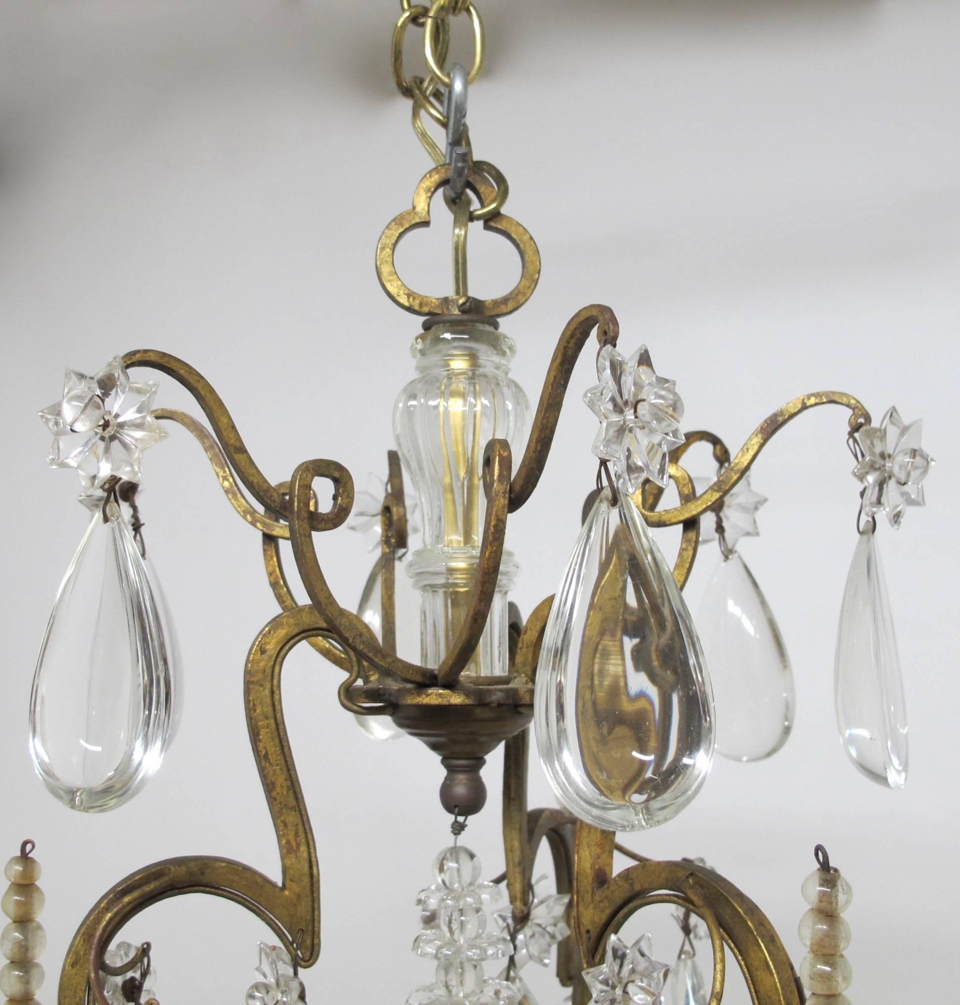 Gilt Iron and Crystal Nine-Light Chandelier In Excellent Condition In San Francisco, CA