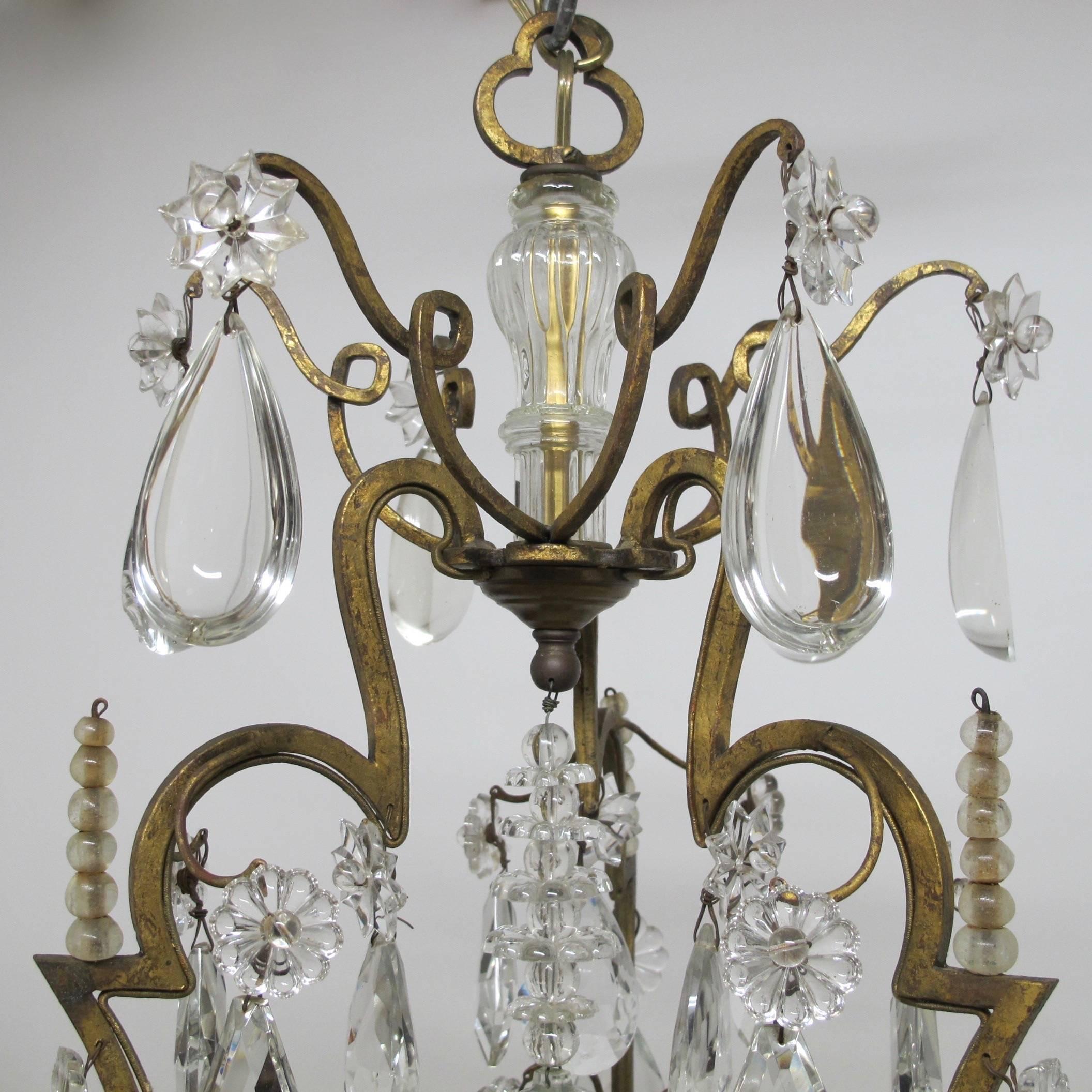 Faceted Gilt Iron and Crystal Nine-Light Chandelier