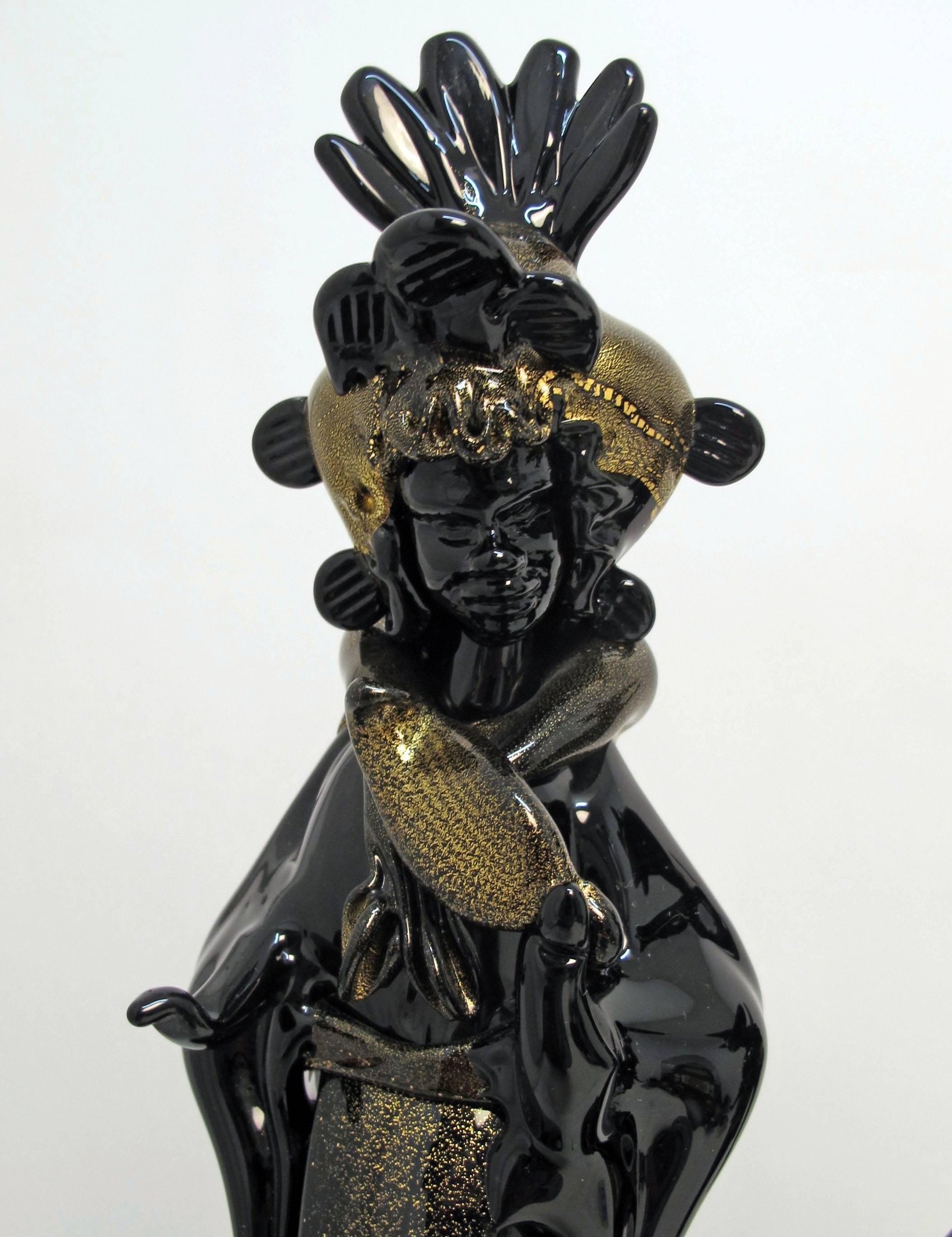 A fine pair of Moorish Figures in Venetian Dress.  Hand blown Black Murano Glass with Gold accenting by Barovier, Italy, 1930s.
