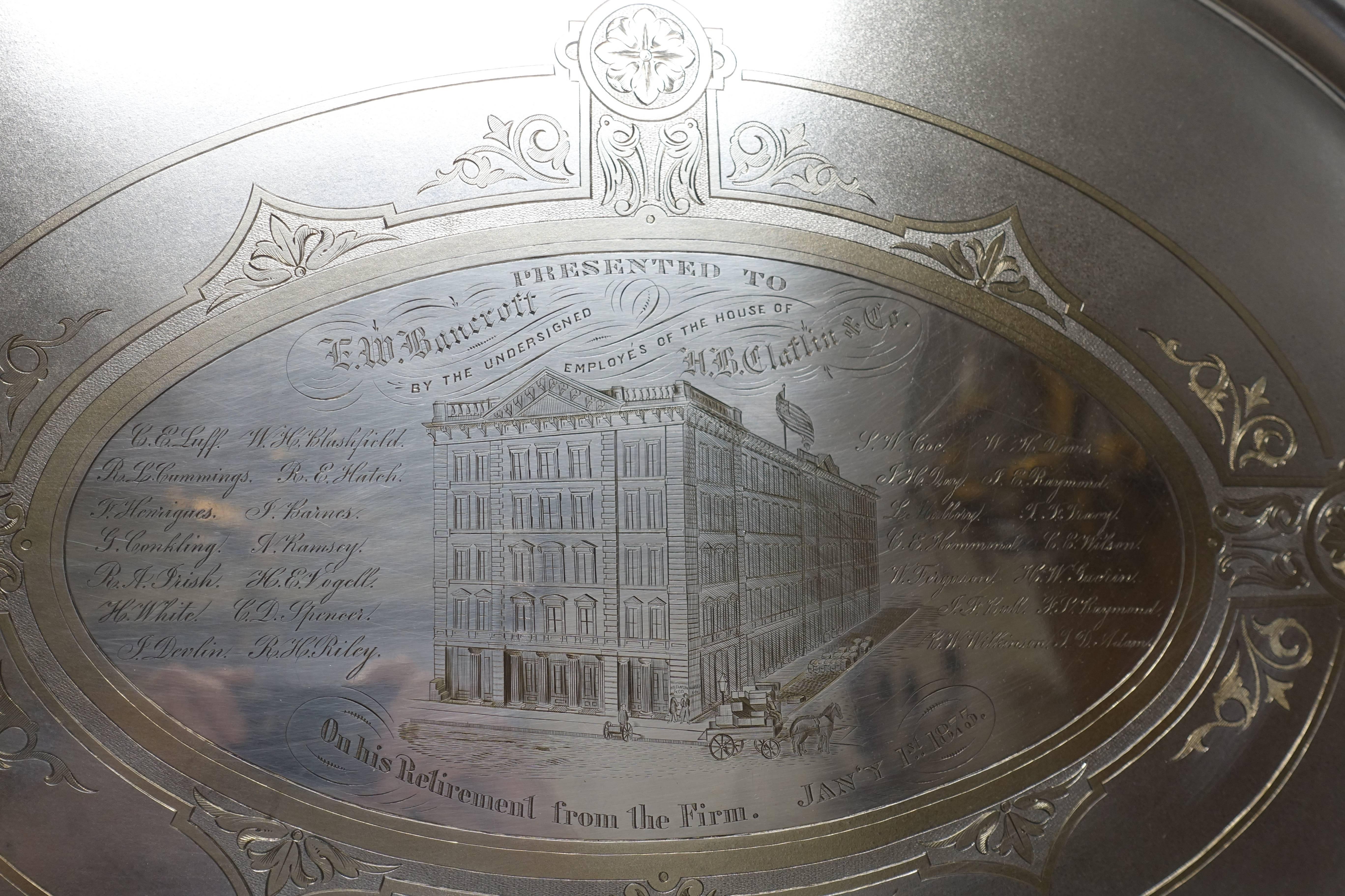 Impressively large Aesthetic Movement handled silver plate tray with very fine engraving. Beautifully hand written script, fine detailing to the building and horse pulling a cart full of boxes, having a pale gold wash over the engraving. Presented