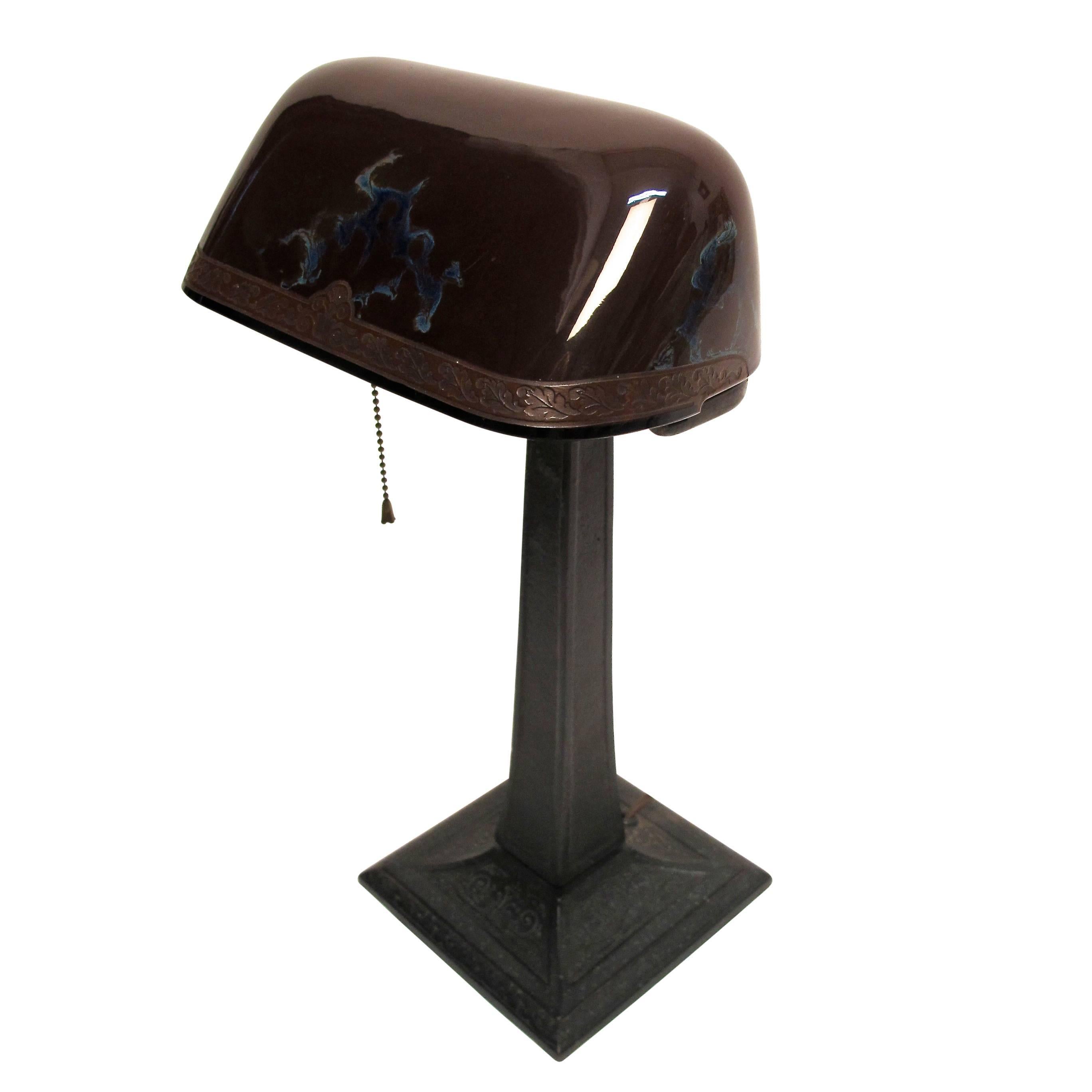 Emeralite desk lamp with unusual cased art glass shade and metal base, American, early 20th century.