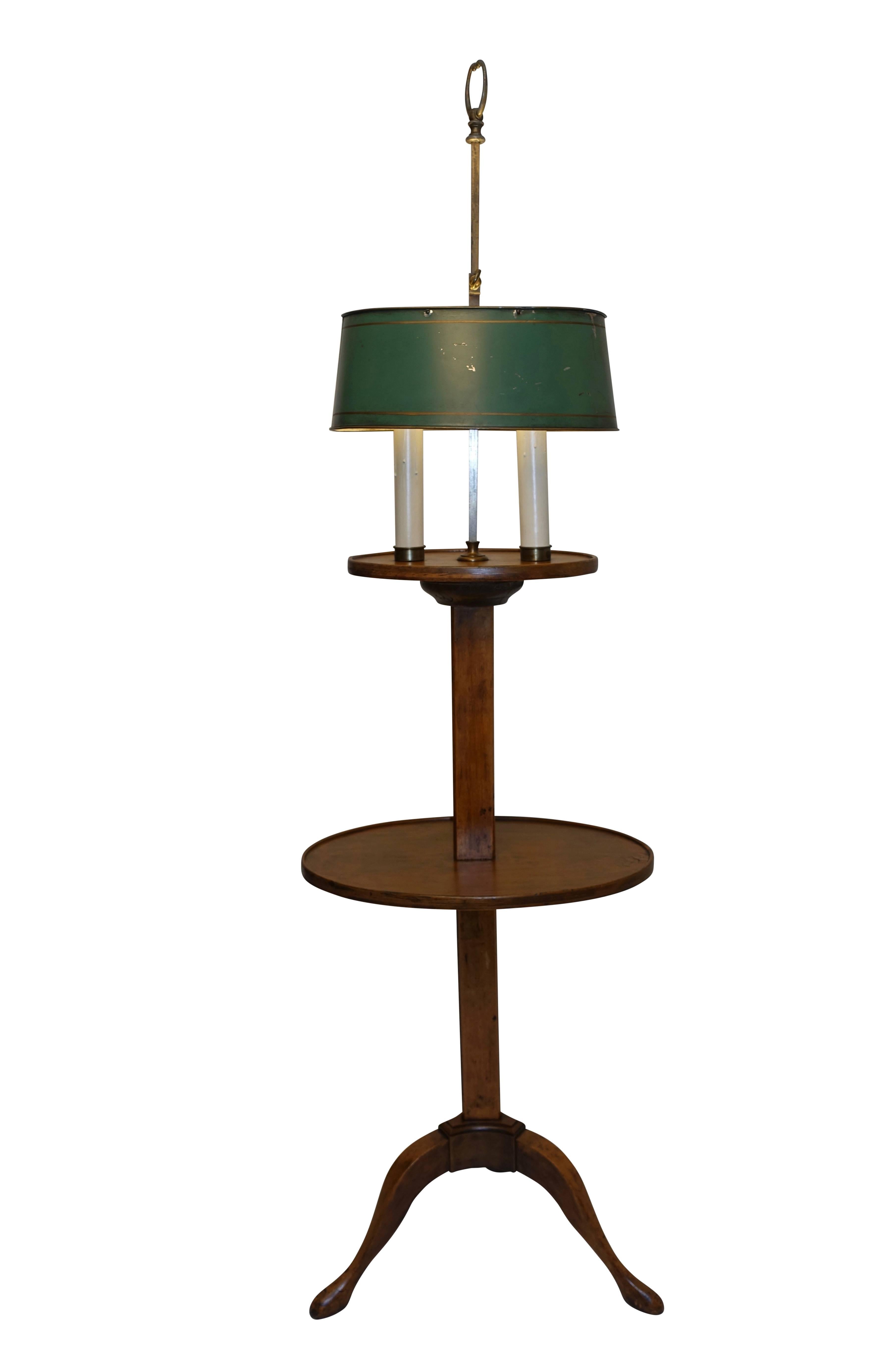 Fruitwood bouillotte two-light candle stand lamp with green tole shade. Having a triangular center shaft standing on three splayed legs. Recently electrified. France, circa 1860.