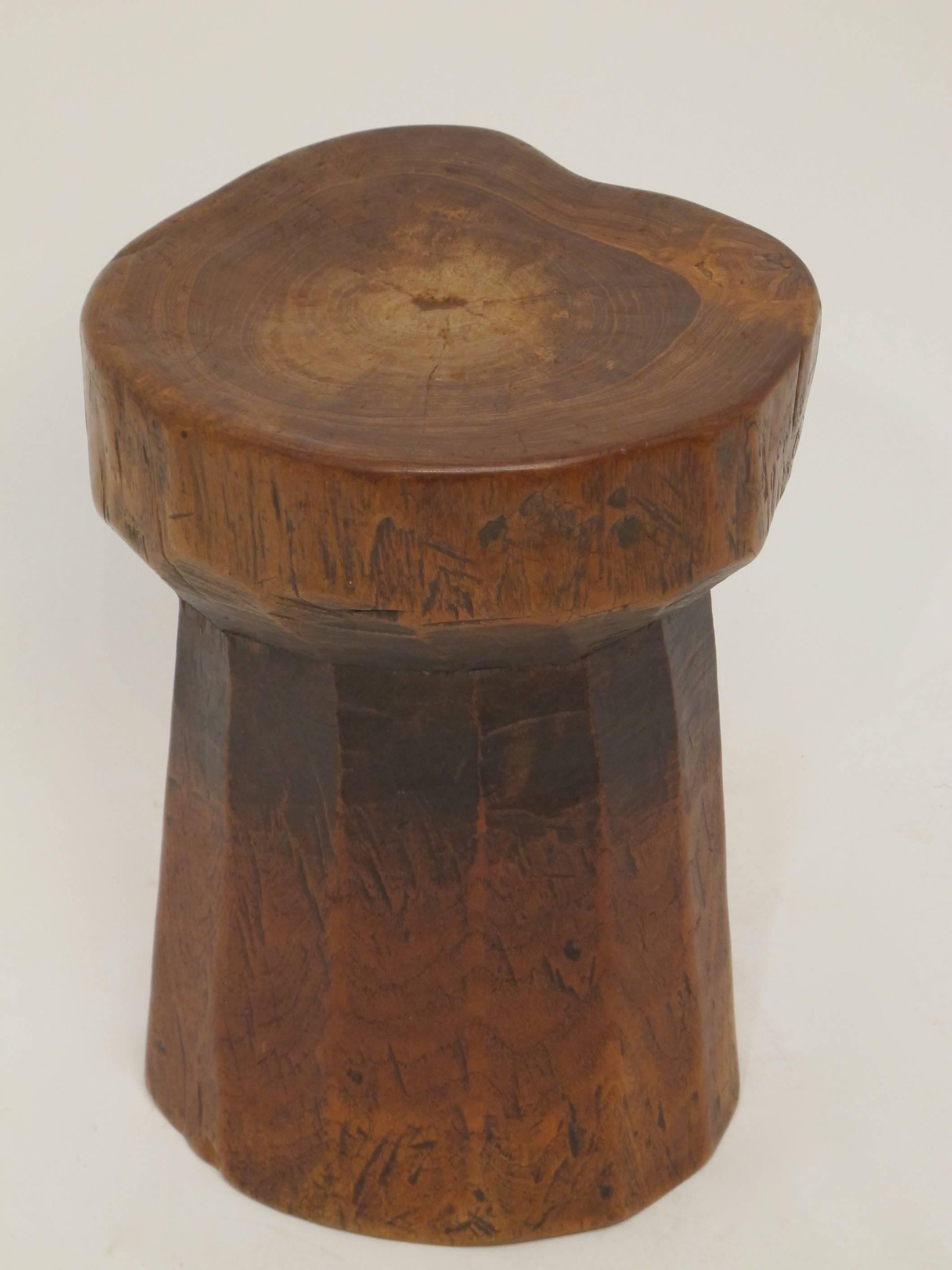 A 19th century hand hewn elm wood garden seat or stool.