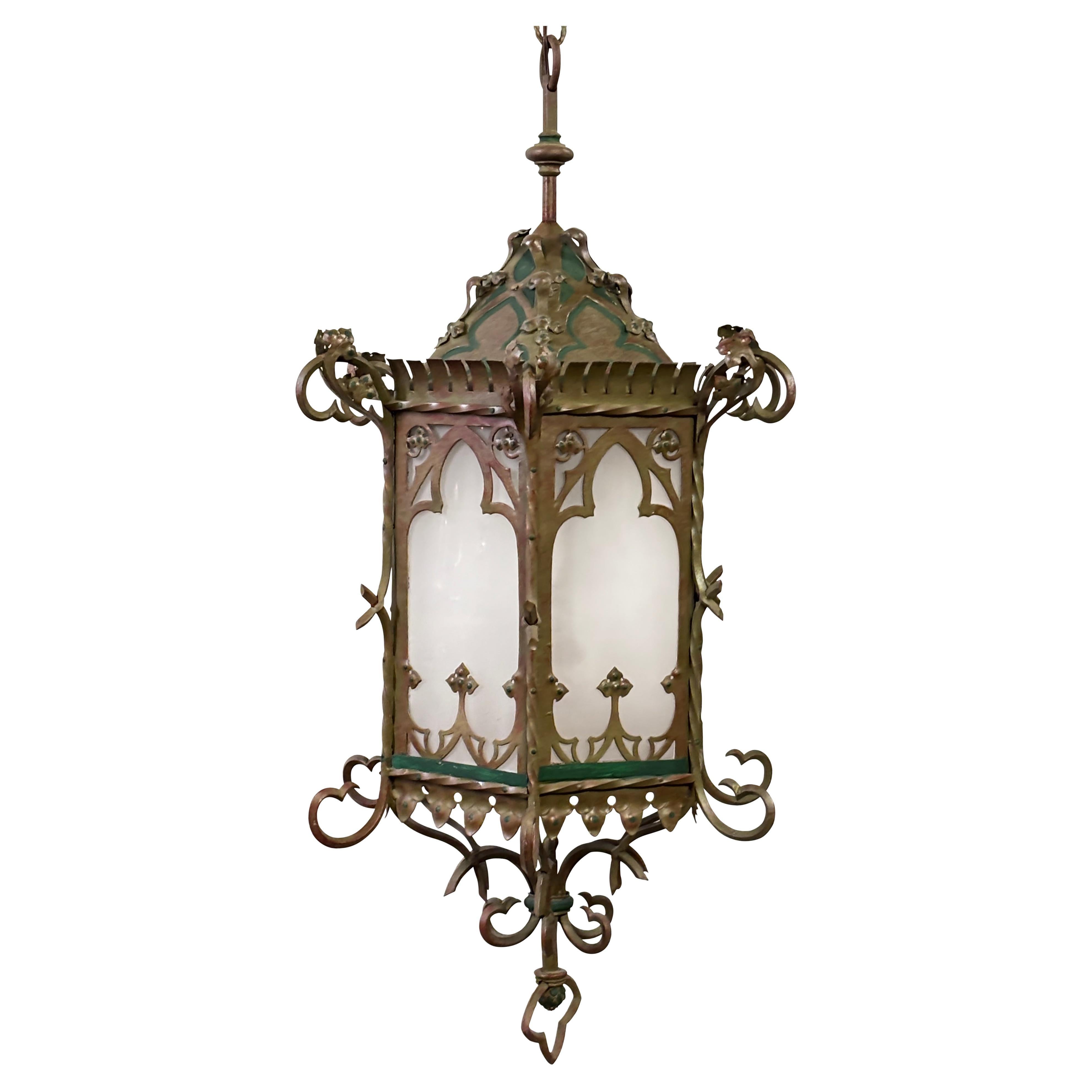 Highly unusual and large scale, excellent quality Asian inspired antique lantern. Wrought iron and steel with old green paint and frosted glass panels. There is a hinged door that opens to replace light bulb.
Possibly this originally was a gas