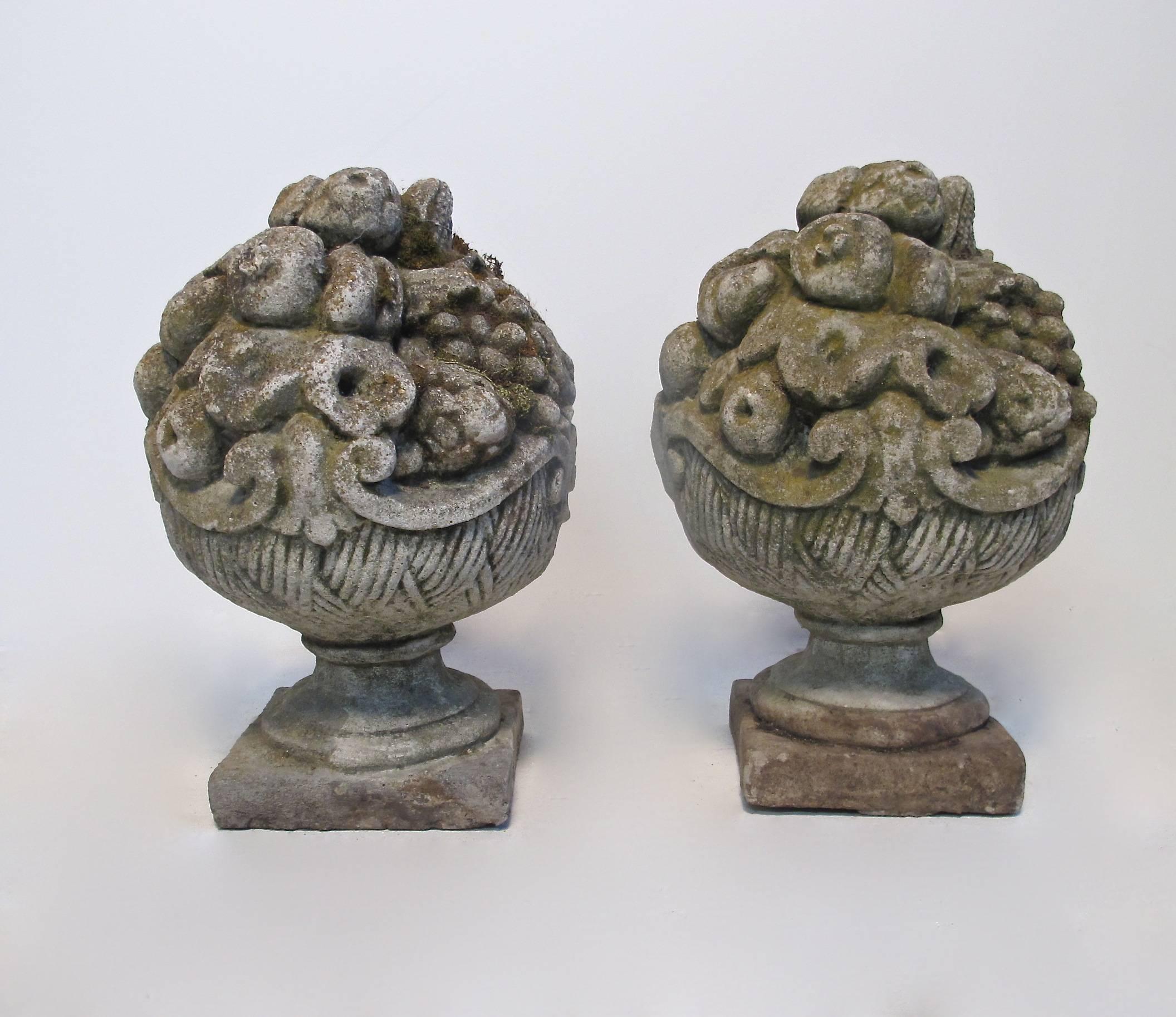 Wonderful Pair of overflowing fruit baskets made of Cadogan Stone in great condition with crusty weathered look.  Some minor abrasions, completely intact.
English, 19th. Century. 