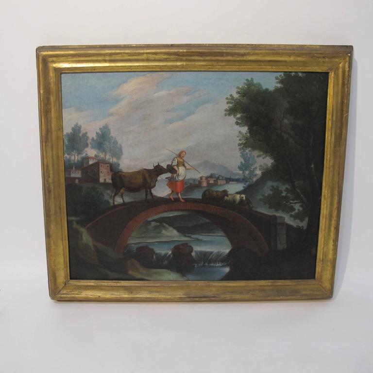 Charming old Italian village scene of a young girl with her cow and sheep. Oil on canvas in giltwood frame. The painting without the frame measures 19 3/4