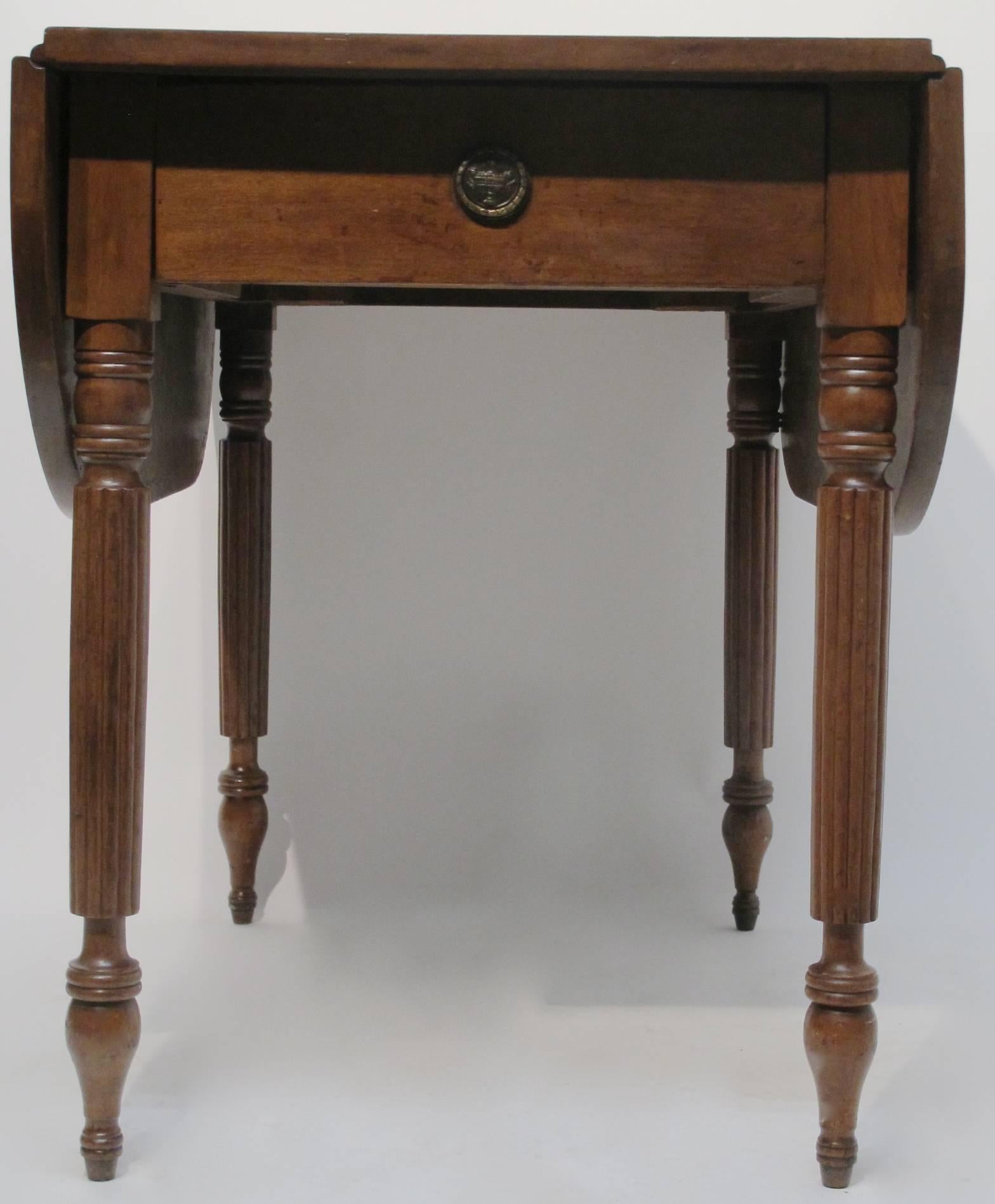 Wonderful size honey colored William IV mahogany Pembrooke table with single drawer on four turned and reeded legs. Deep drop leaves are 11 1/2 inches each. England, mid 19th century.
This would make for a great games table or dining table for two.