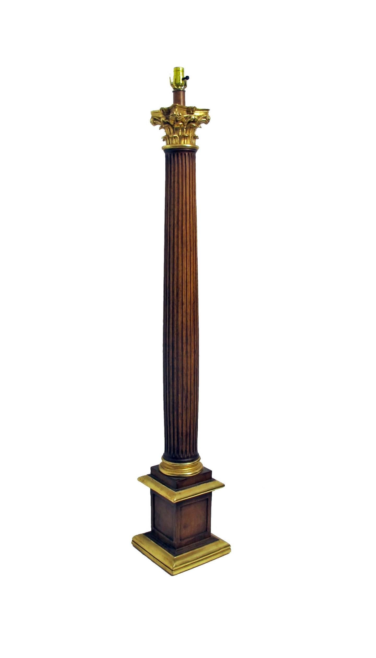 A good quality neoclassical style wood and parcel-gilt Corinthian column floor lamp, American, mid-20th century.