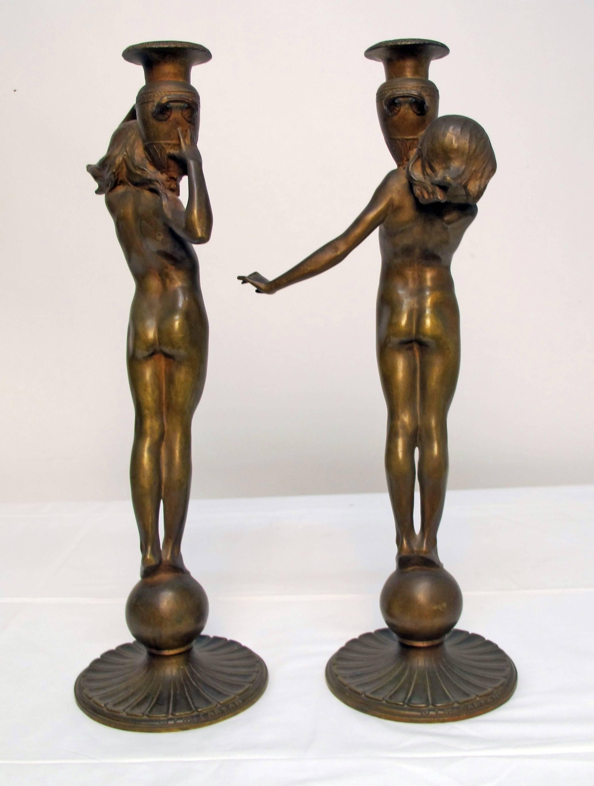 A pair of Art Nouveau period bronze bookends, signed E. McCartan (b.1879-1947), American, late 19th to early 20th century.
Edward Francis McCartan was active/lived in New York. He is known for sculptor-allegorical figure, monument.