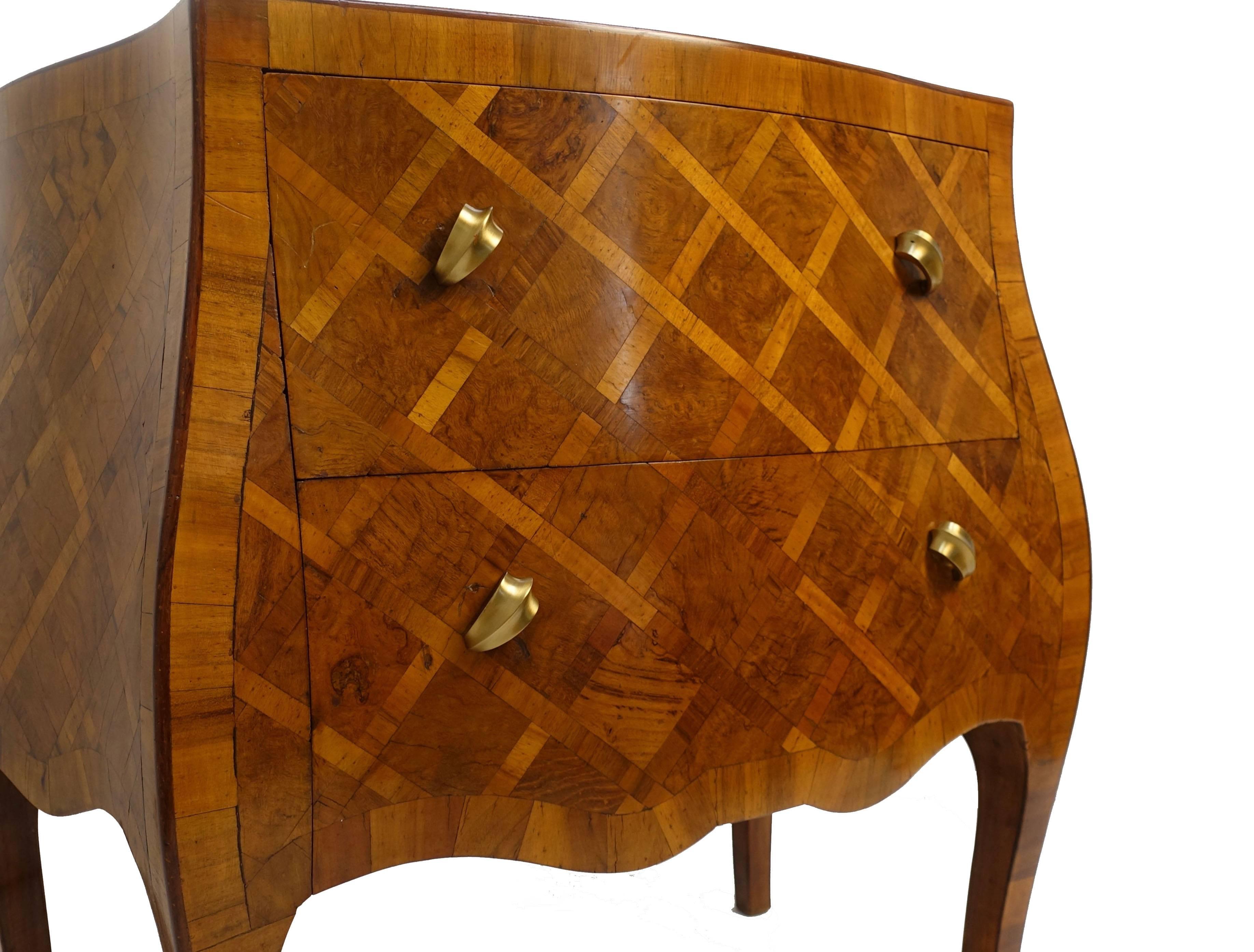 Beautiful figured olivewood two-drawer bombe parquetry commode with inlaid cross hatch lattice design on the top and front, standing on cabriole legs, Italy, circa 1960.