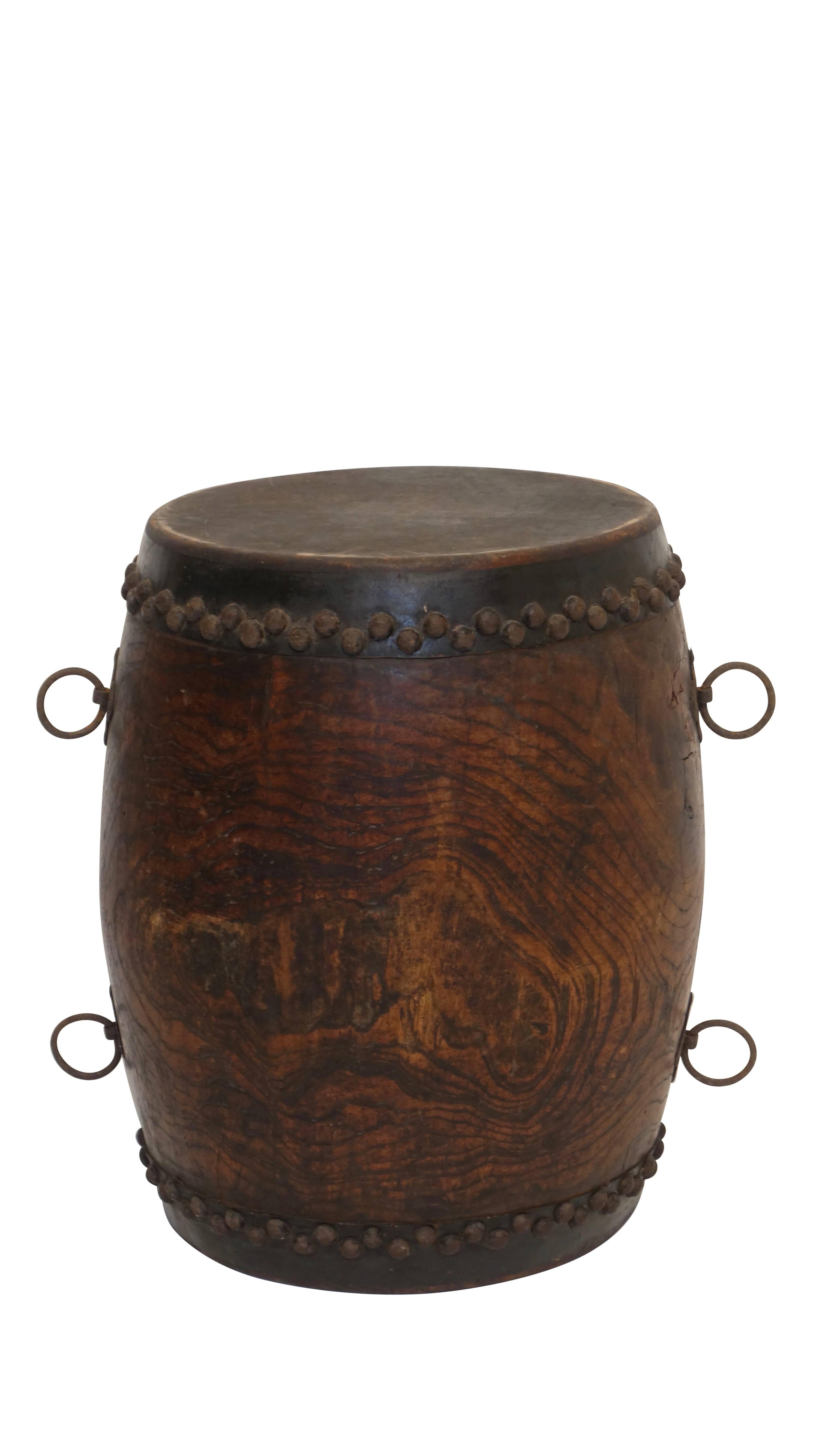 Beautifully grained wood drum with nice iron handles and tacks. Can be used as side tables.
Tanggu drum. The tanggu (??; pinyin: tánggu, pronounced [t????kù]; literally "ceremonial hall drum"; sometimes spelled tang gu) is a traditional