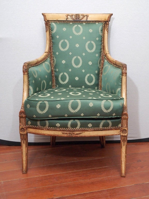 A pair of neoclassical style creme peinte armchairs, the backs 