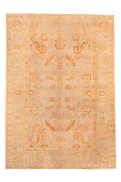 Soft Neutral Oushak Rug in Ivory, Apricot and Golden Tones