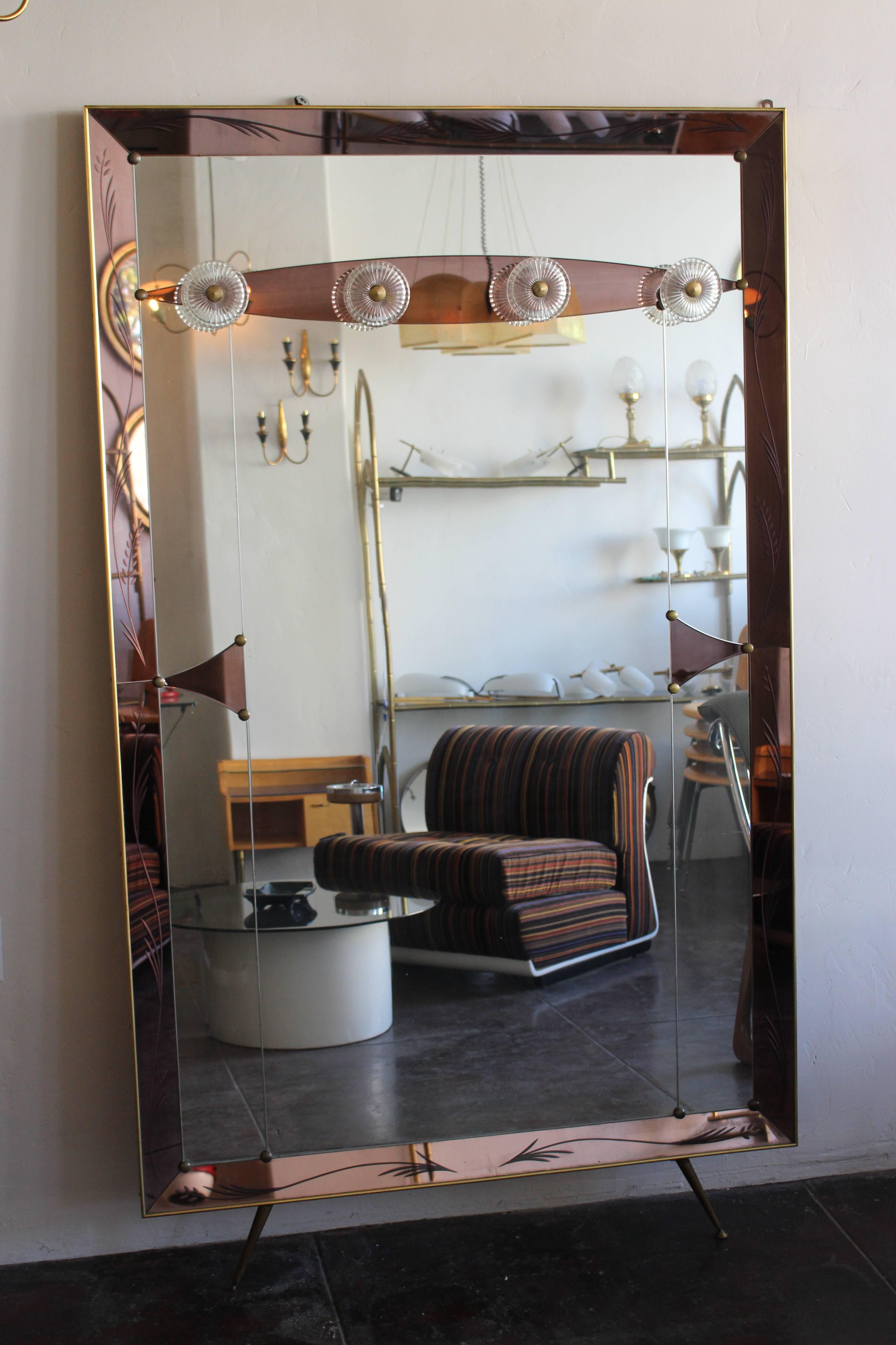 Italian 1950s full length mirror brass base and hand-cut mirror.