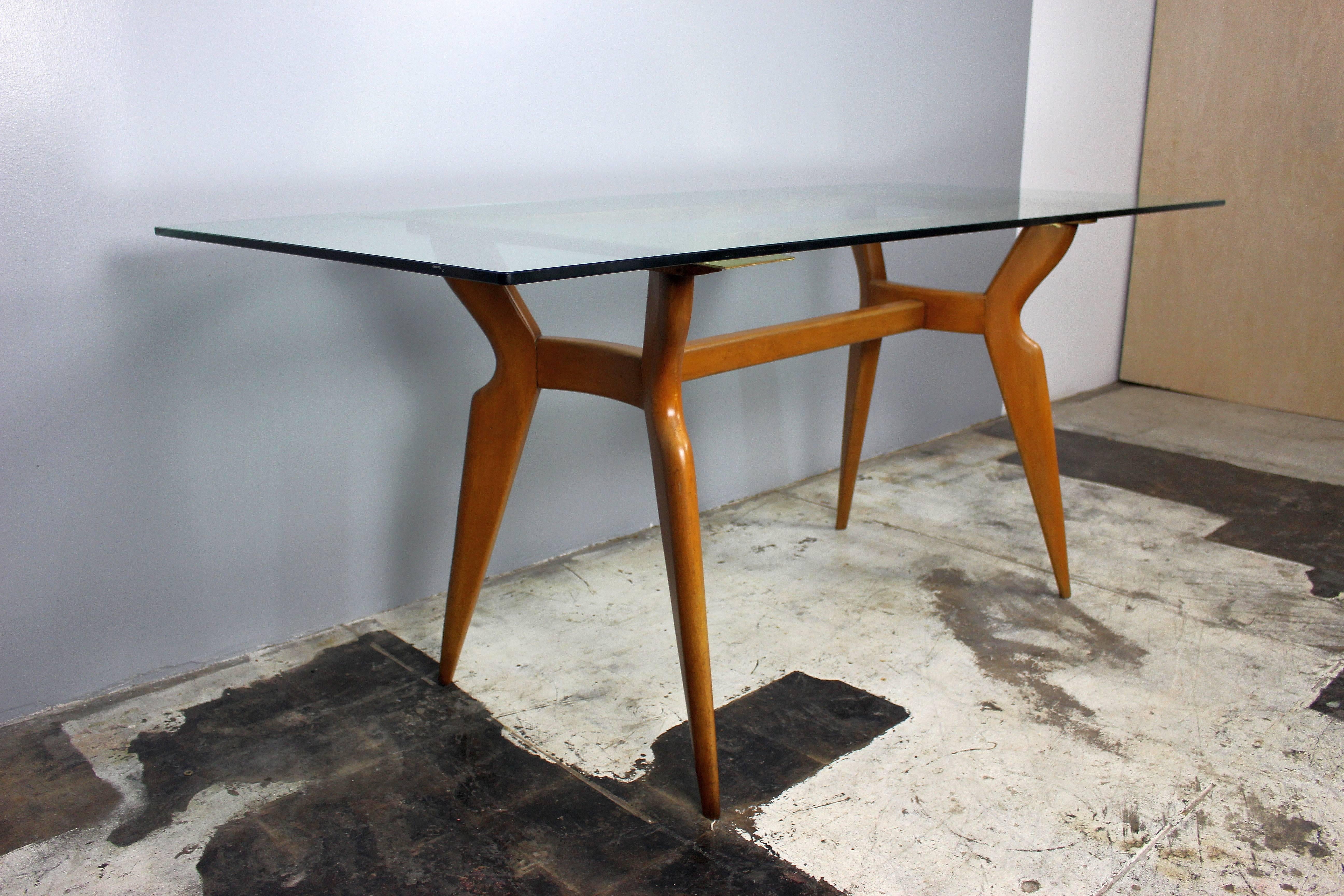 Table is in style of Gio Ponti all together nice look and essential Italian design
wood base and top is 1/2 inch glass or approximately 1.25 cm thick table is in good vintage condition no scratches on the glass.

Pls note: Item is located at