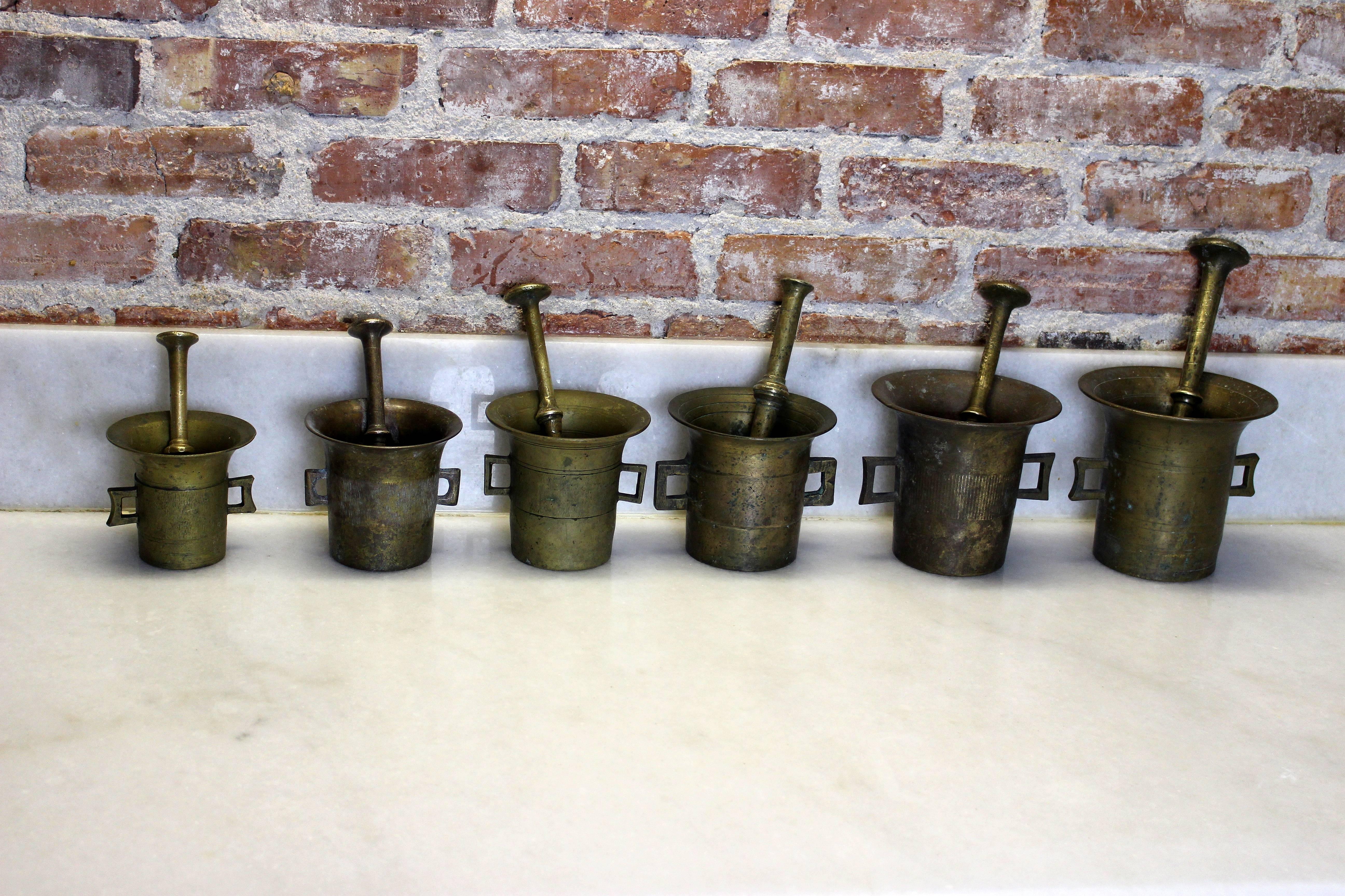 Campaign 19th Century European Mortar and Pestles Set of Nine Pieces