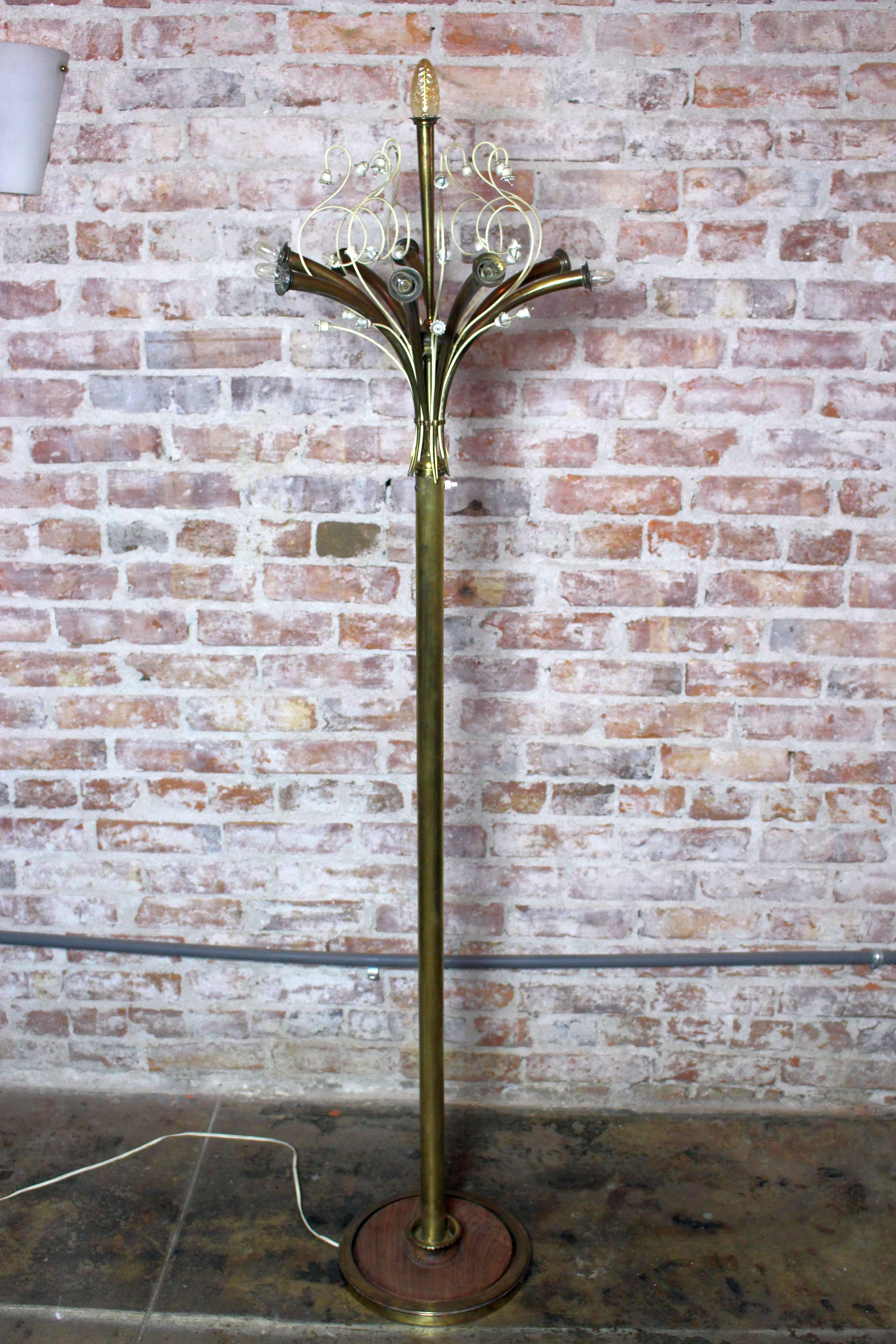 1950s Italian brass floor lamp with the rosewood and brass base.

