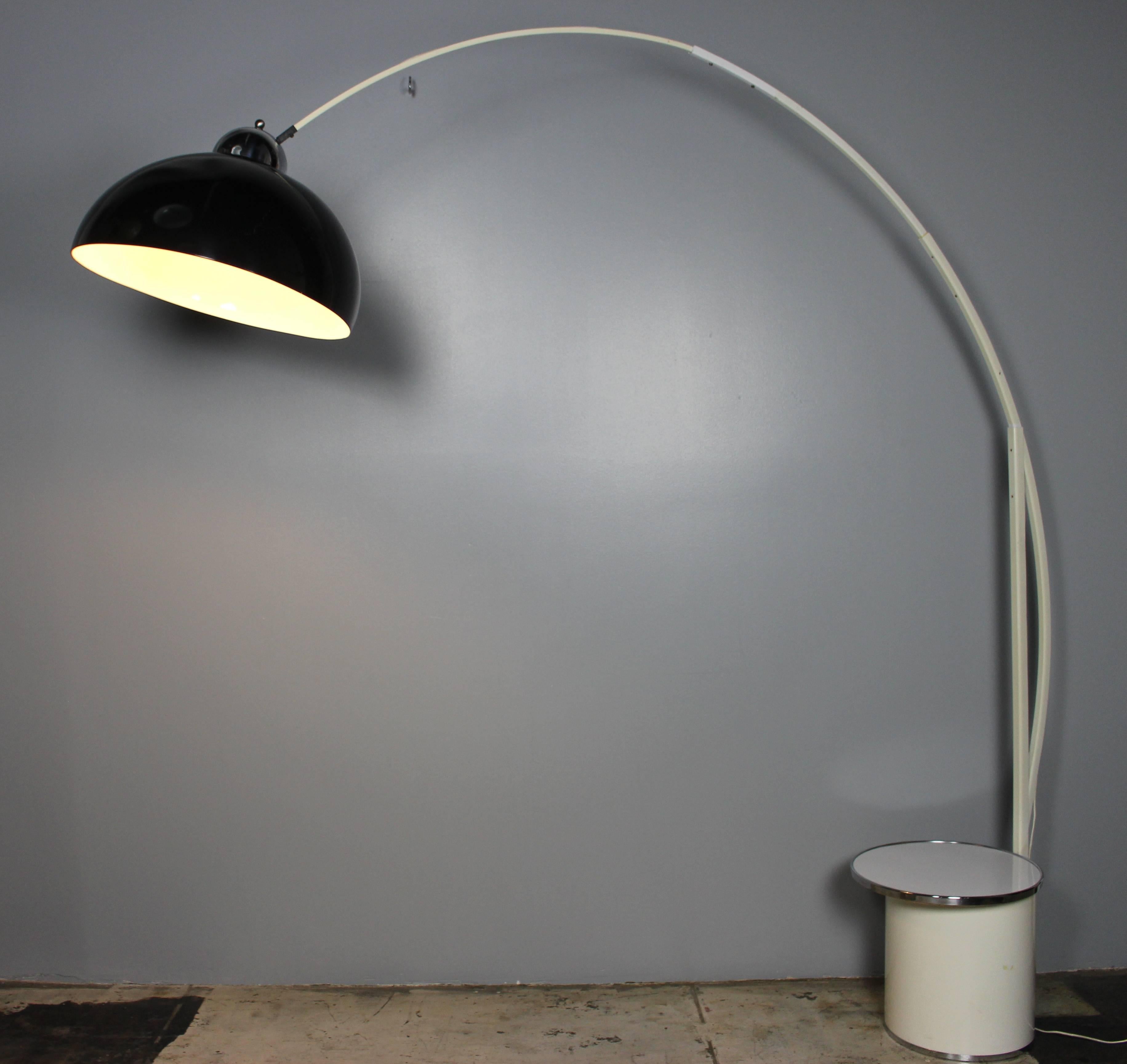A large Italian 1970s floor lamp with the small cocktail table. Table is 16 inches in diameter.

Pls note: Item is located at Beverly Store
7274 Beverly Blvd 
Los Angeles, CA 90036
