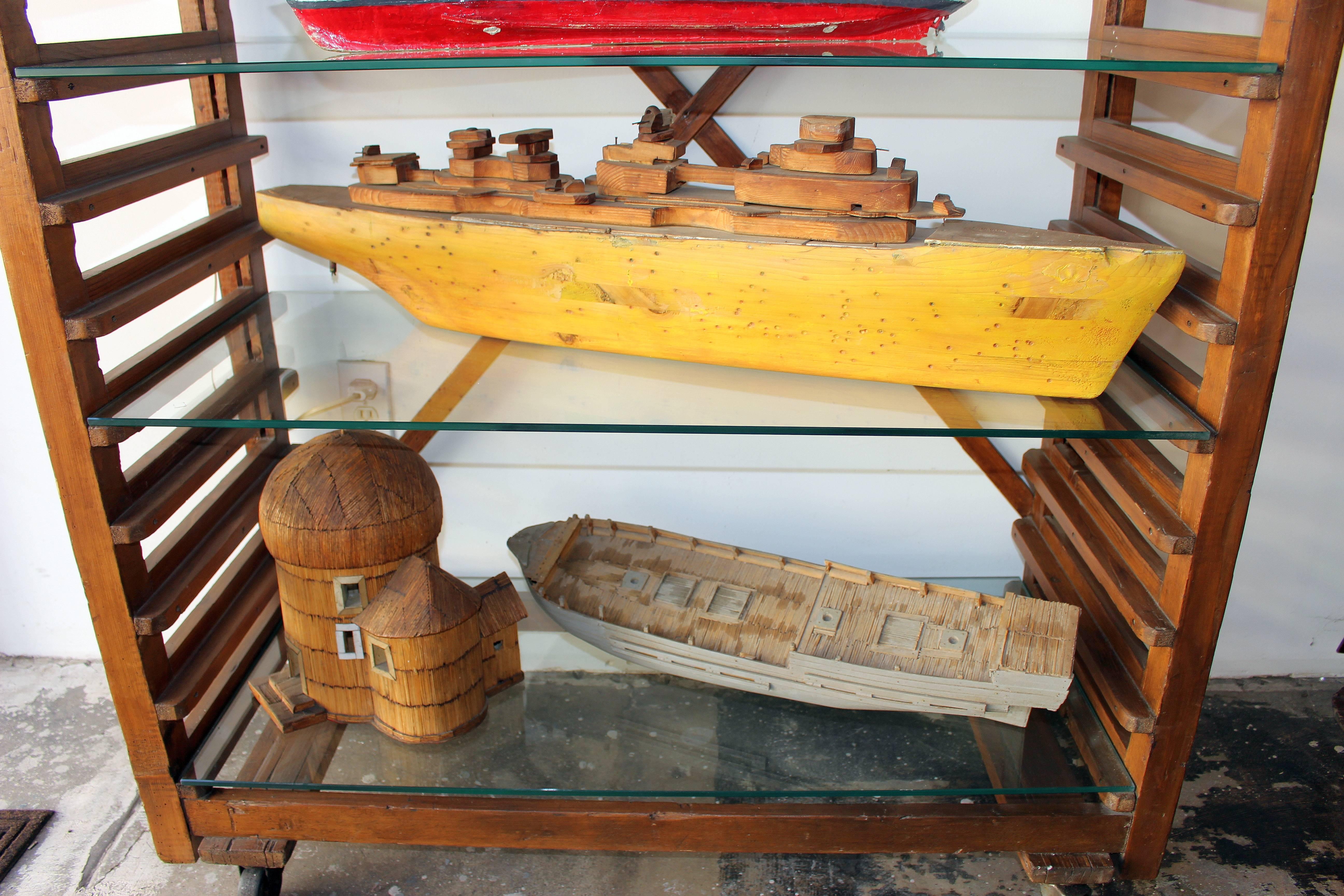  Italian boat collection. Bakers rack is unavailable,price is only for the boat collection a set of 5 boats, boats are various dimension .