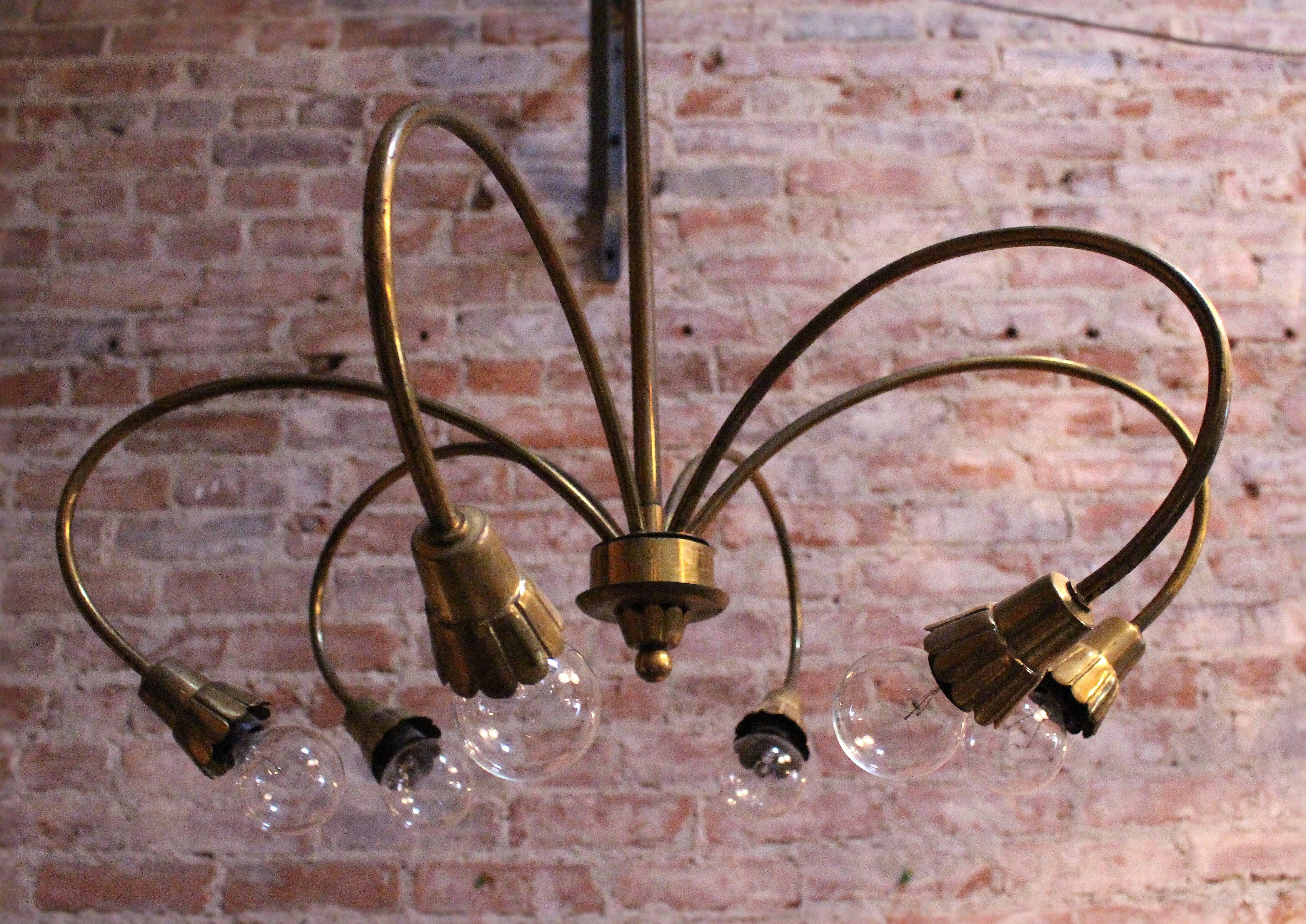Sputnik six-arm brass chandelier in original condition wonderful patina 

Item is at the Beverly Location
7274 Beverly Blvd 
Los Angeles, CA 90036.