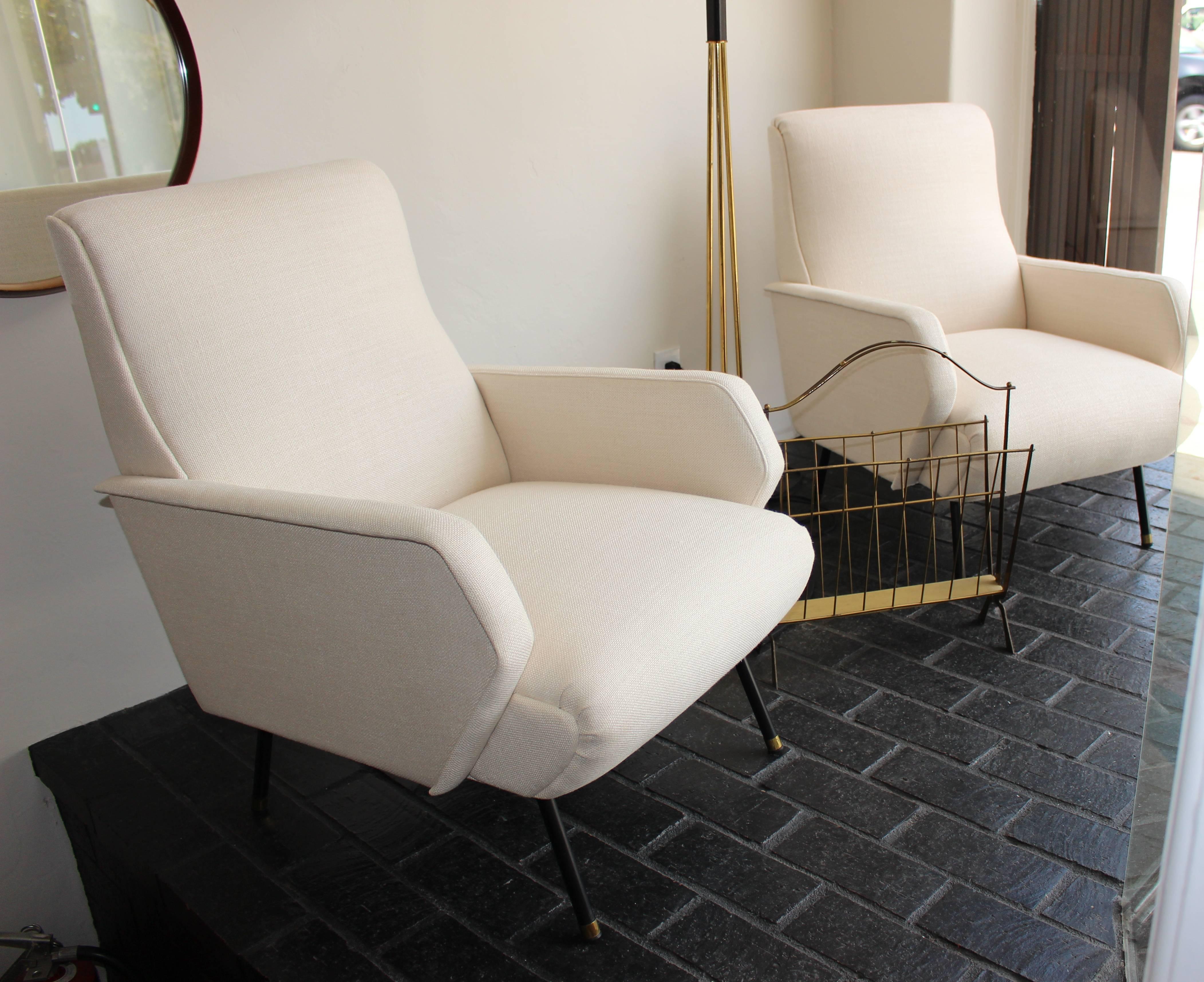 Italian pair of chairs new reupholstered in Italian linen. Metal and brass legs.
