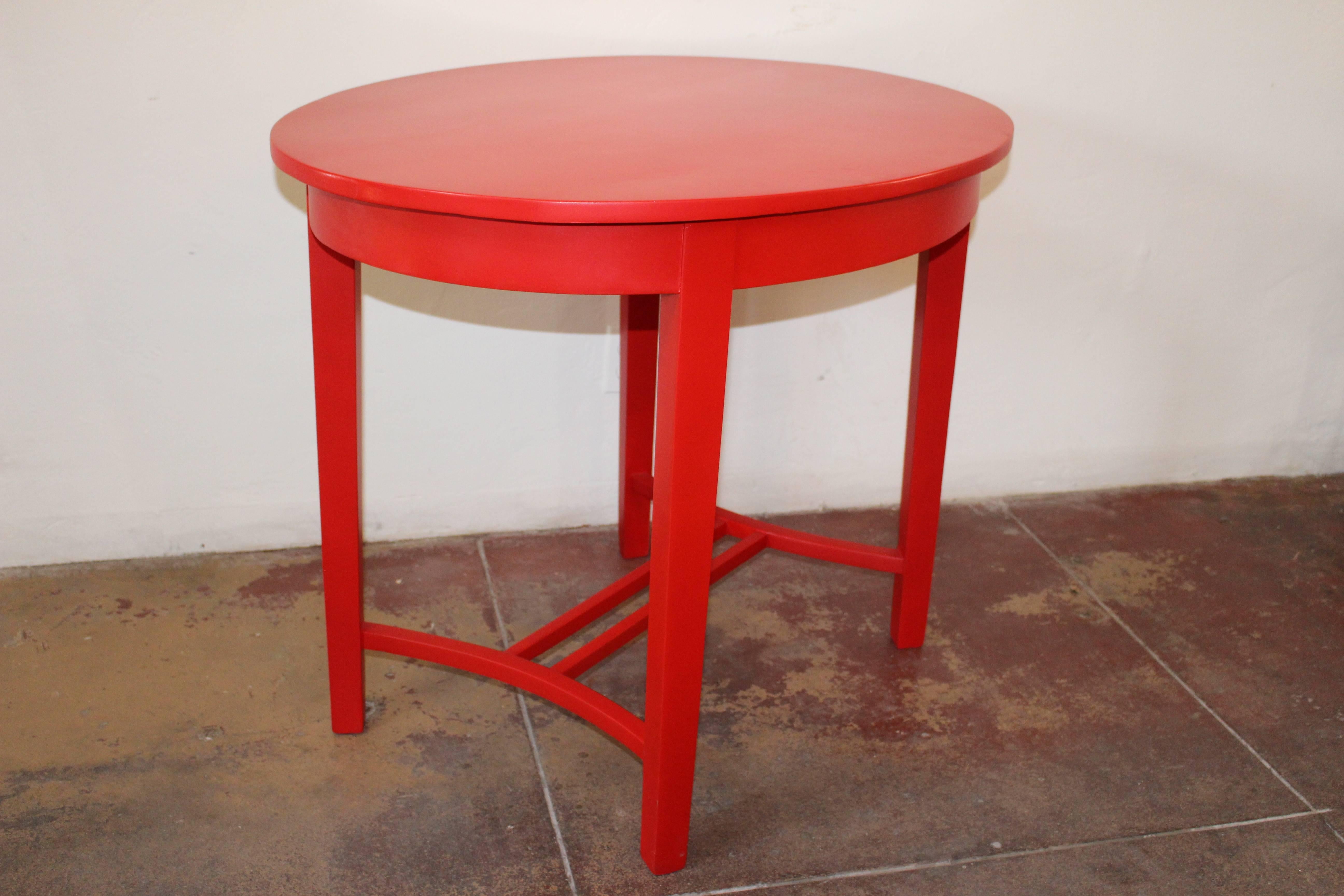 Red lacquered French Art Deco style side table.