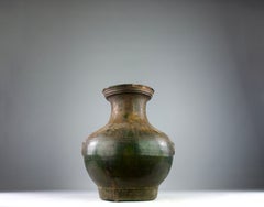 Han Dynasty, Green-Glazed Hu Vase Taotie Mask Handles, China (202 BCE – 220 AD)
