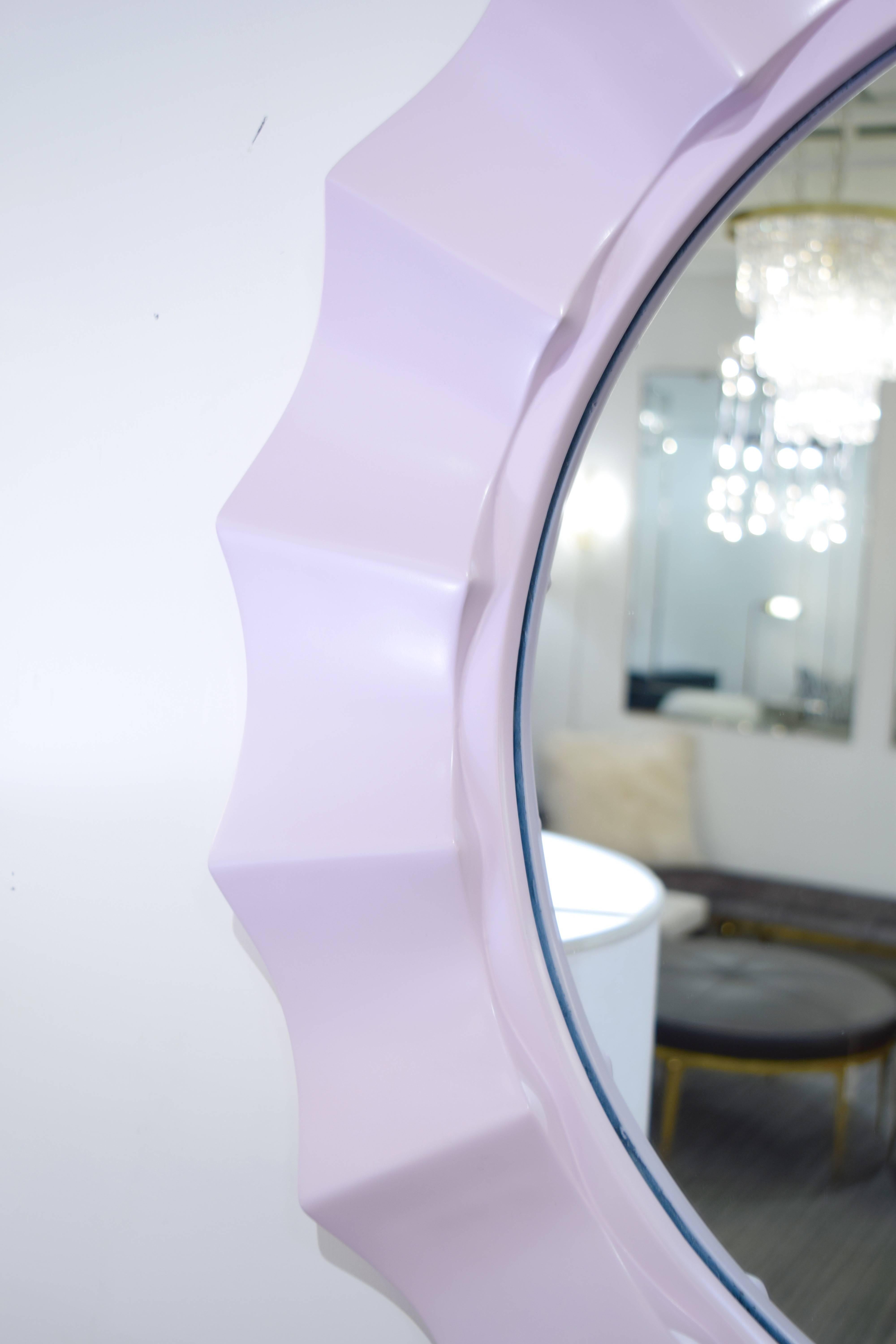 Finished in a soft lilac lacquer, this 1970's scalloped mirror is the perfect addition to today's decor.   Some crazing on Lacquered finish.