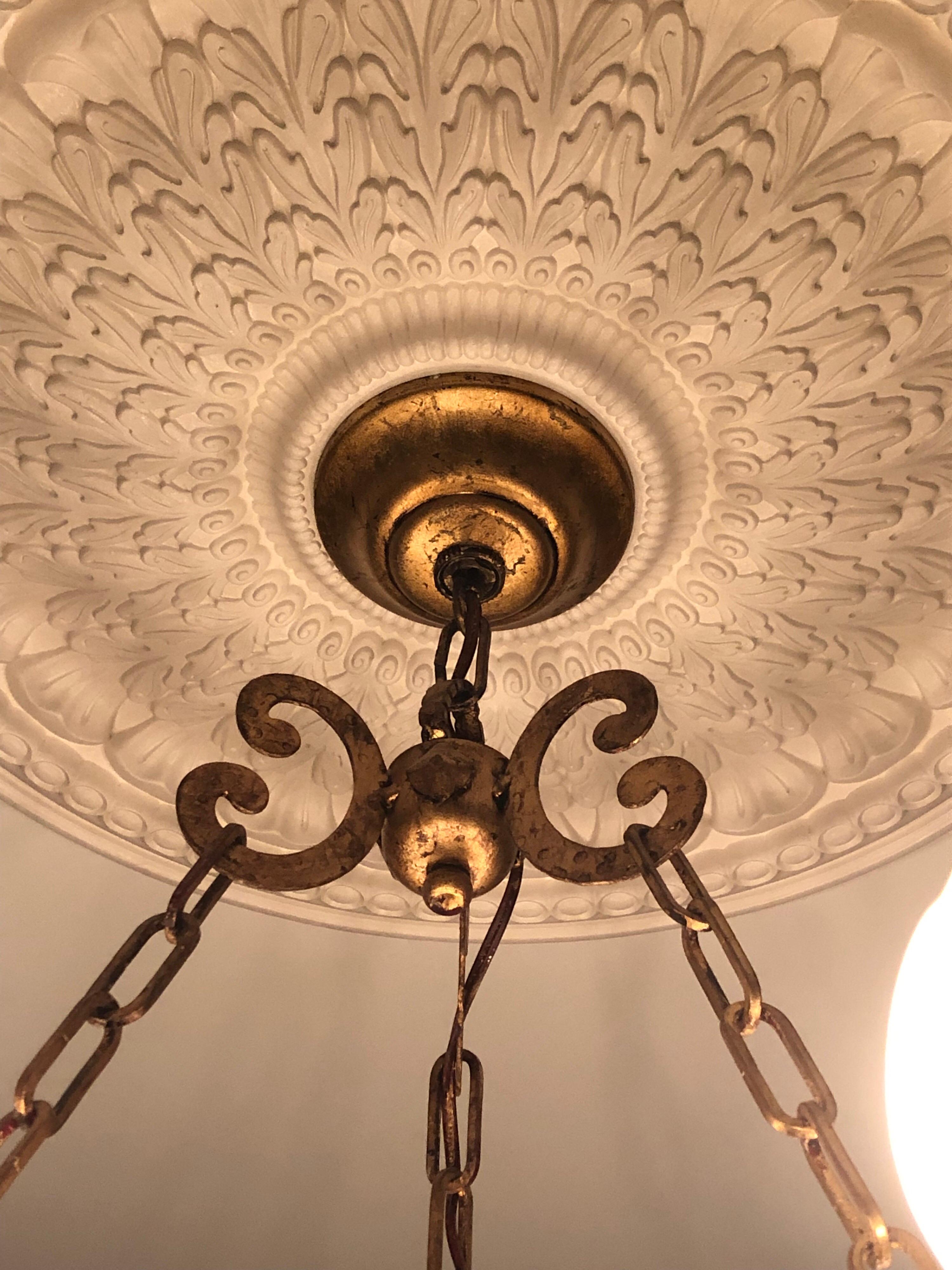 Large 12 Light Hollywood Regency Iron Gold Leaf Chandelier In Good Condition In New York, NY