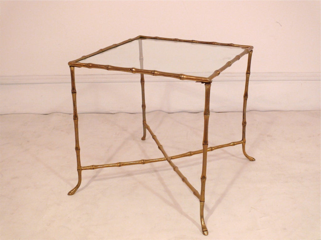 Gorgeous brass faux bamboo side table with mercury mirror top.