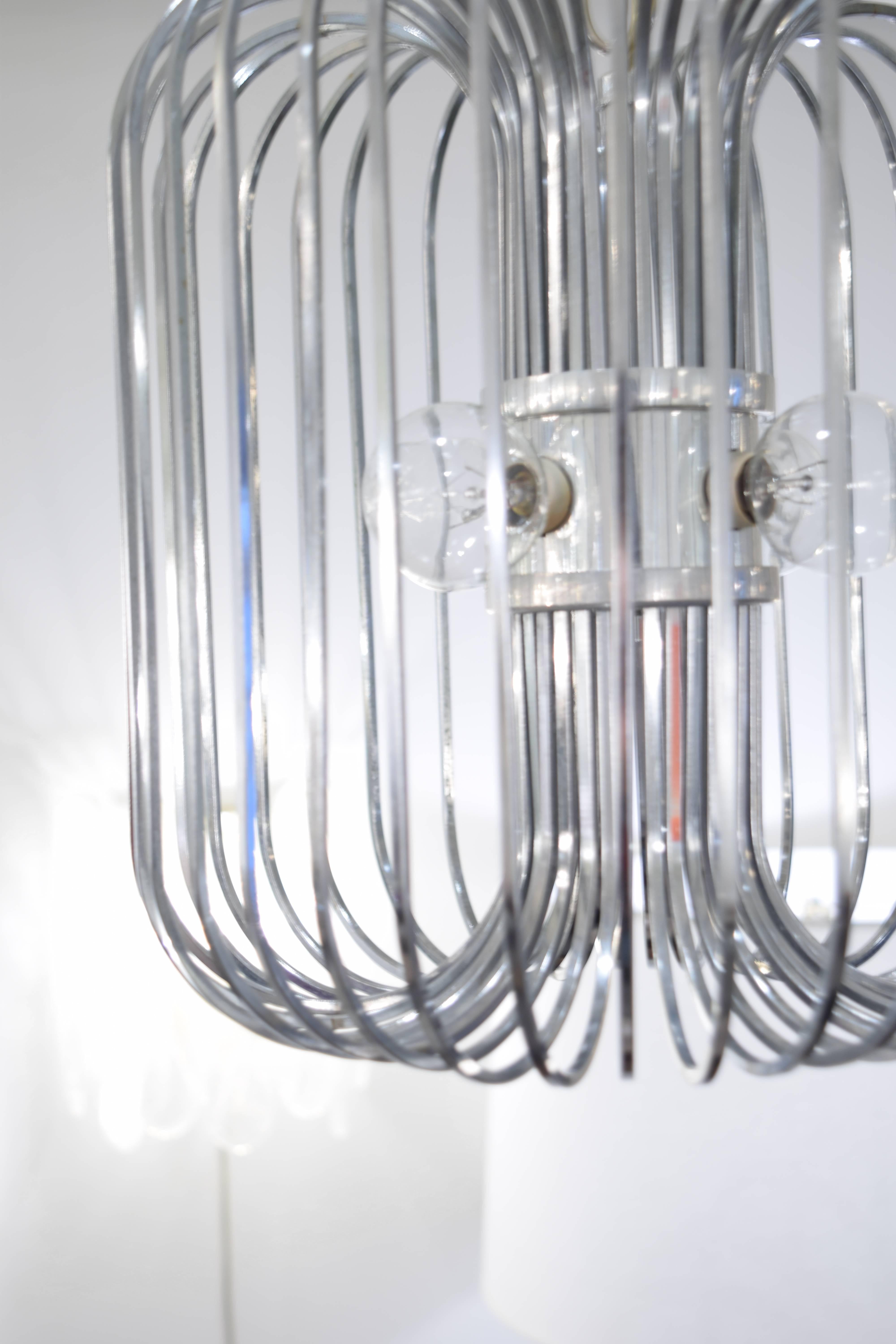 This chandelier designed by Sciolari is constructed out of chrome in the signature 