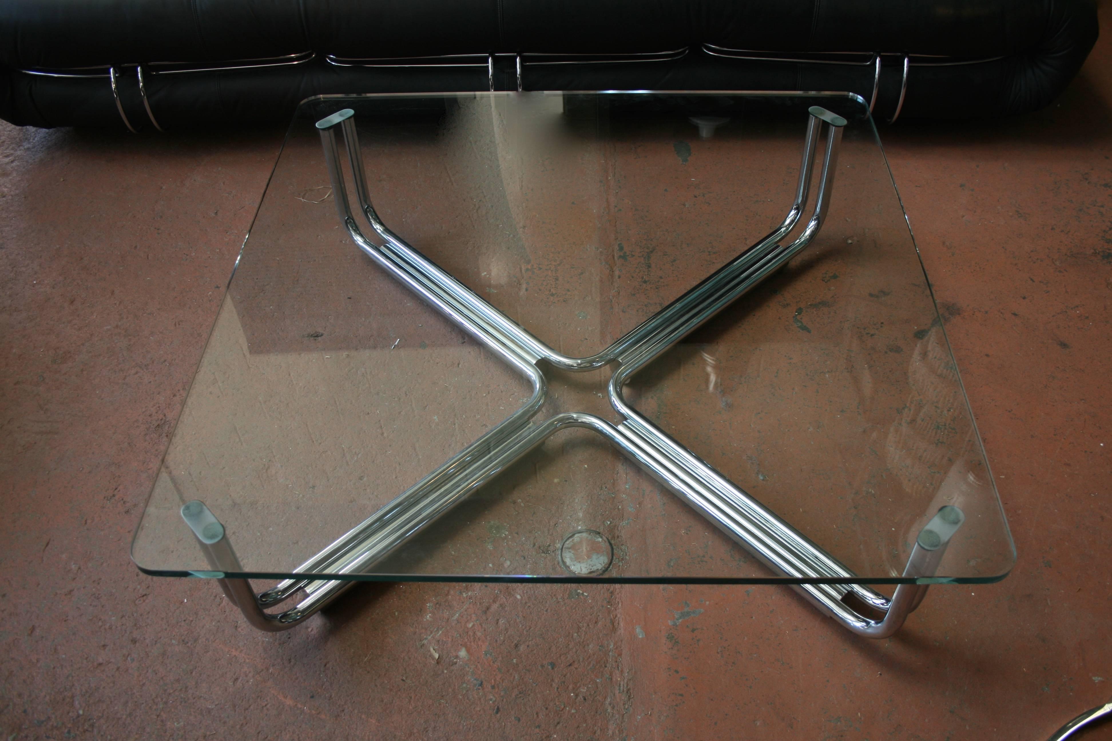 Elegant tubular chrome coffee table with original glass top. Model 784 Cassina.
Avantgarden Ltd. cultivates unexpected and exceptional lighting, furniture and design.  To view items in person please visit our showroom in Pound Ridge, New York.