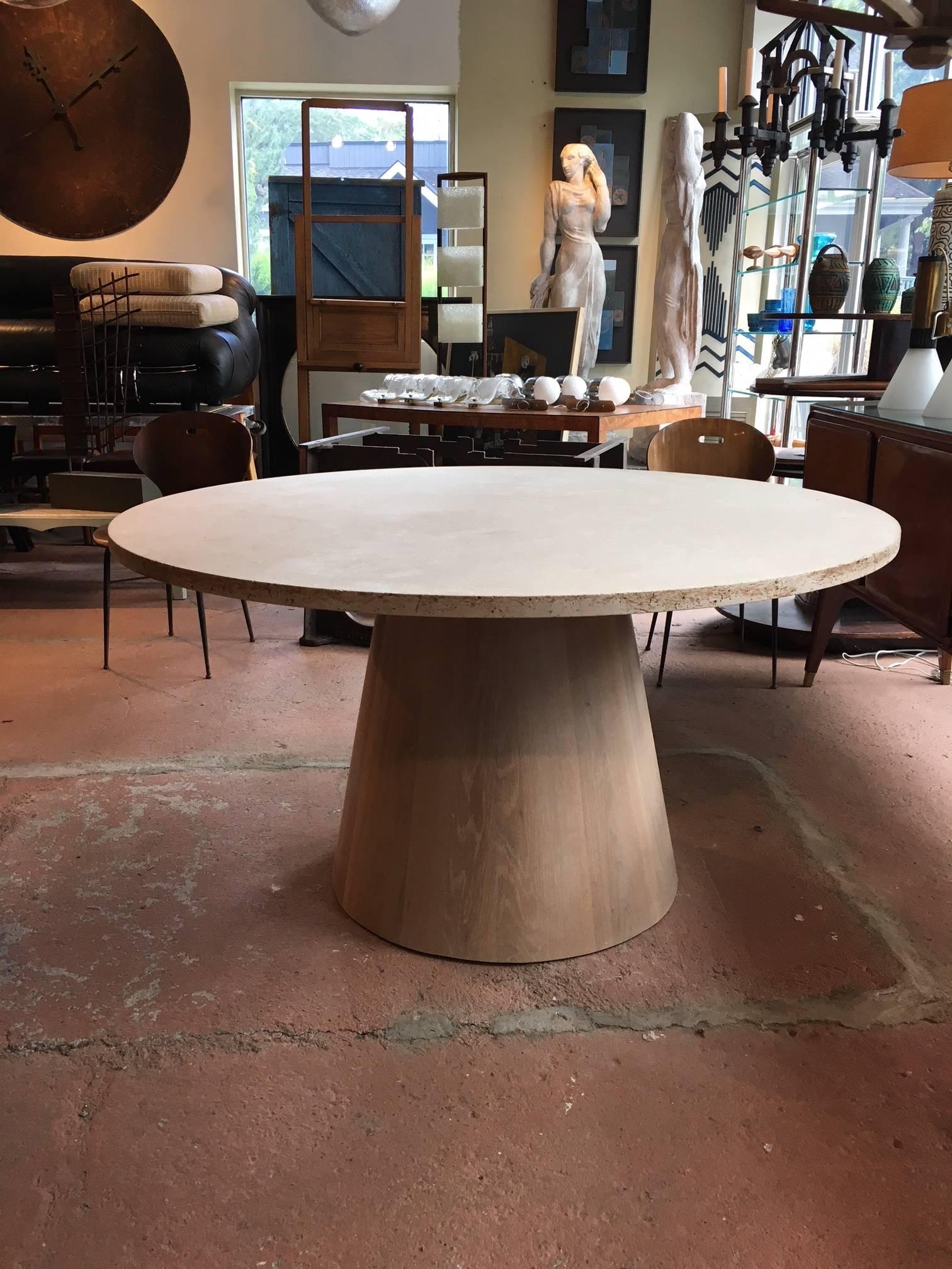 Great craftsmanship with a modern sensibility; travertine top center or dining table with solid oak angled cylinder base with a bleached washed finish; made to order; custom versions and options are available.
Avantgarden Ltd. cultivates unexpected