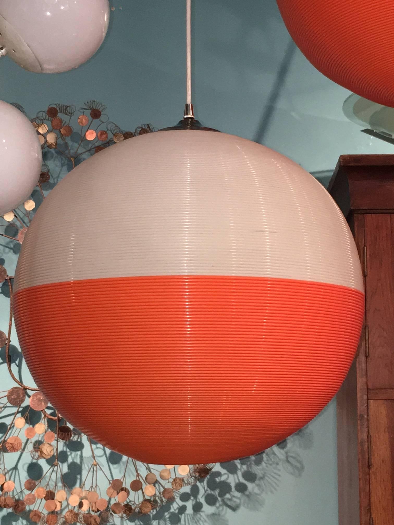 Mid-Century Modern Pair of Orange and White Rotaflex Globe Lights by Heifetz