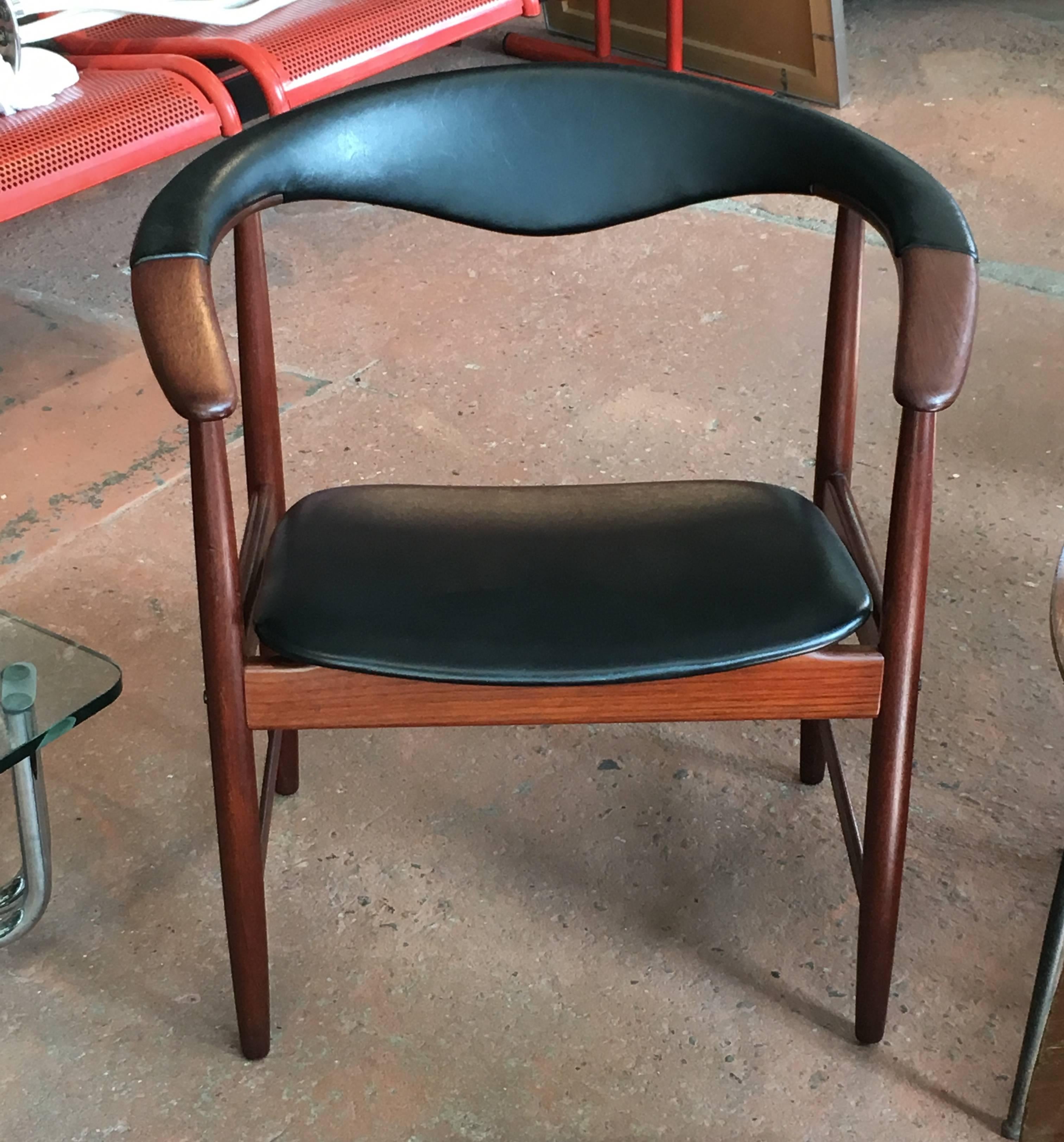 Great example of chair 171, an Arne Hovmand-Olsen design from 1958; teak and black leather armchair or desk chair.