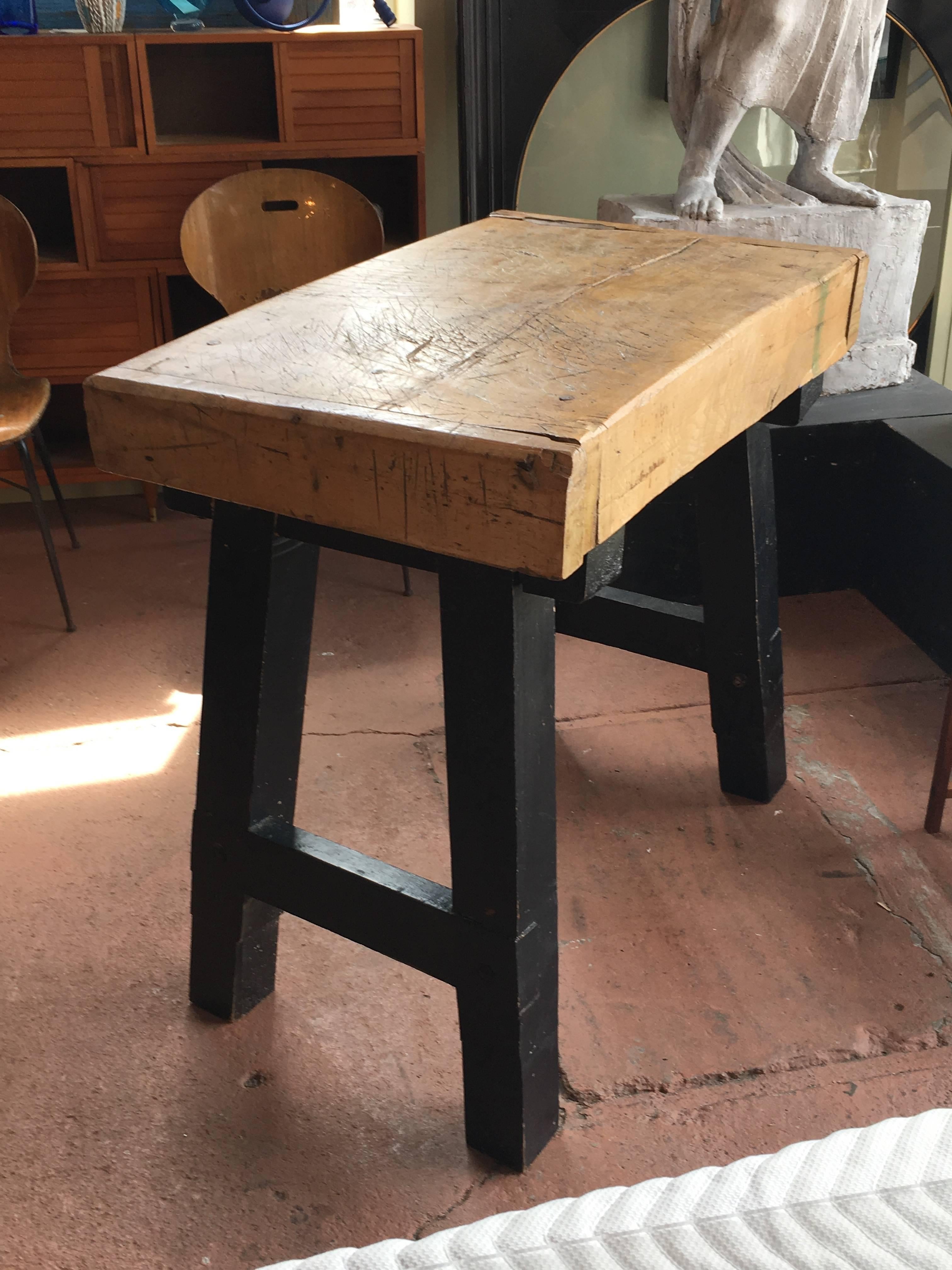 Impressive slab of thick solid elmwood, antique butcher block top with substantial primitive wood base. Great work table, kitchen island or centre table.

Avantgarden Ltd. cultivates unexpected and exceptional lighting, furniture and design. To view