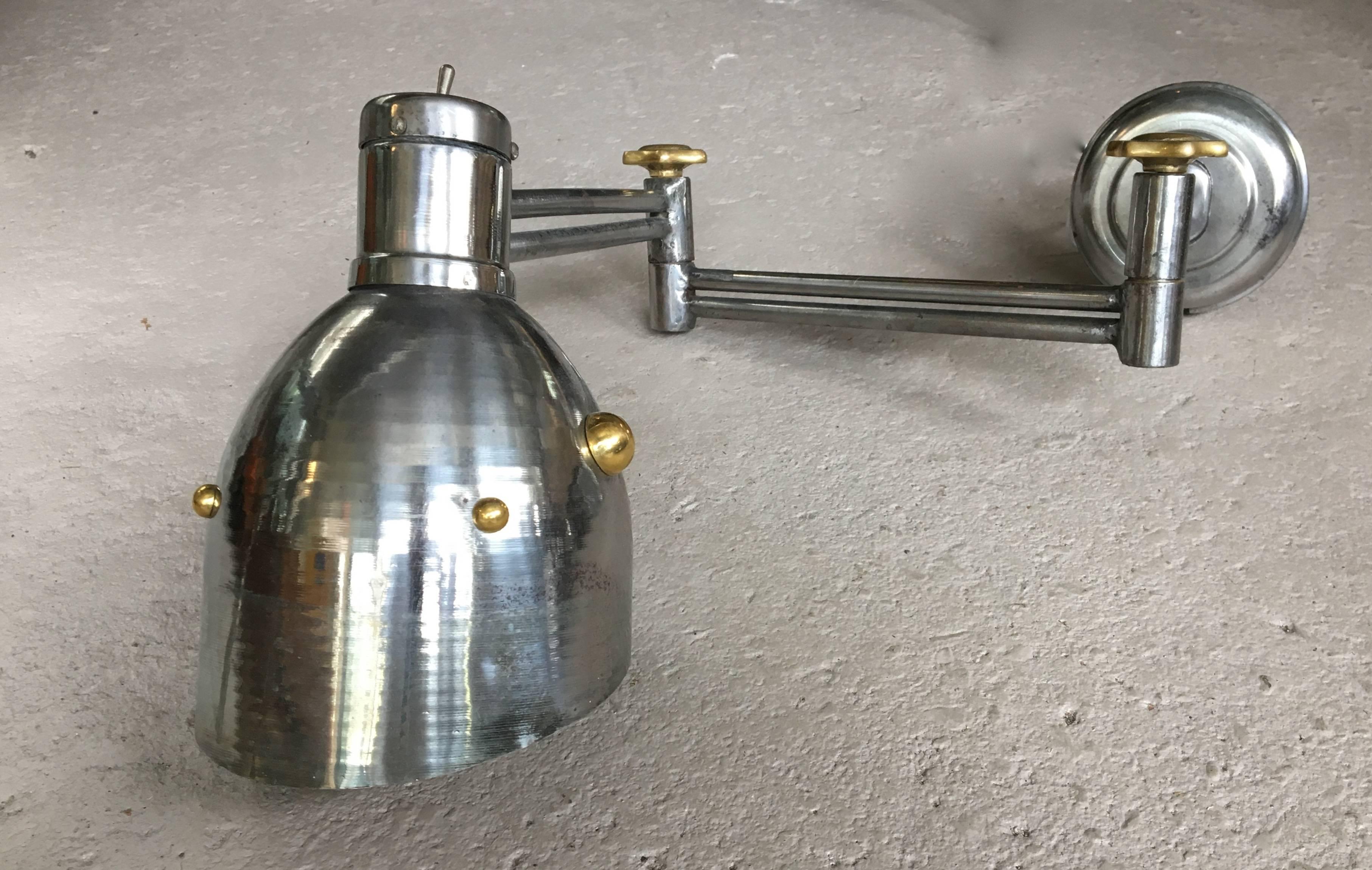 Pair of substantial articulated wall lights, polished steel with brass detailing; all new U.S. wiring. Priced per piece.
Avantgarden Ltd. cultivates unexpected and exceptional lighting, furniture and design. To view items in person please visit our
