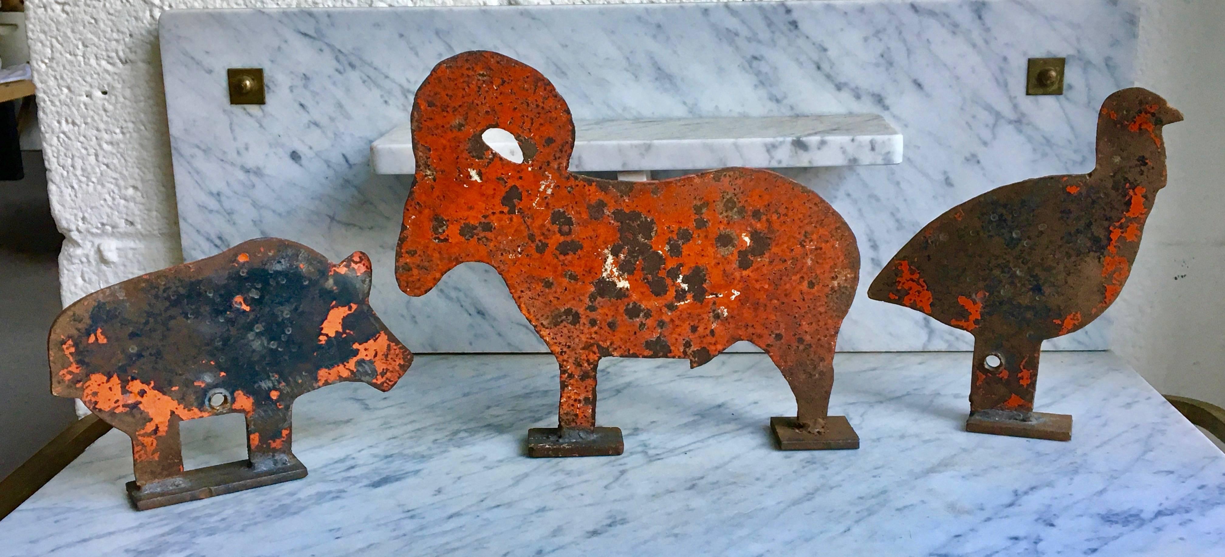 Charming Folk Art target practice forms, ram, boar and turkey, retaining original red paint, double sided.
   