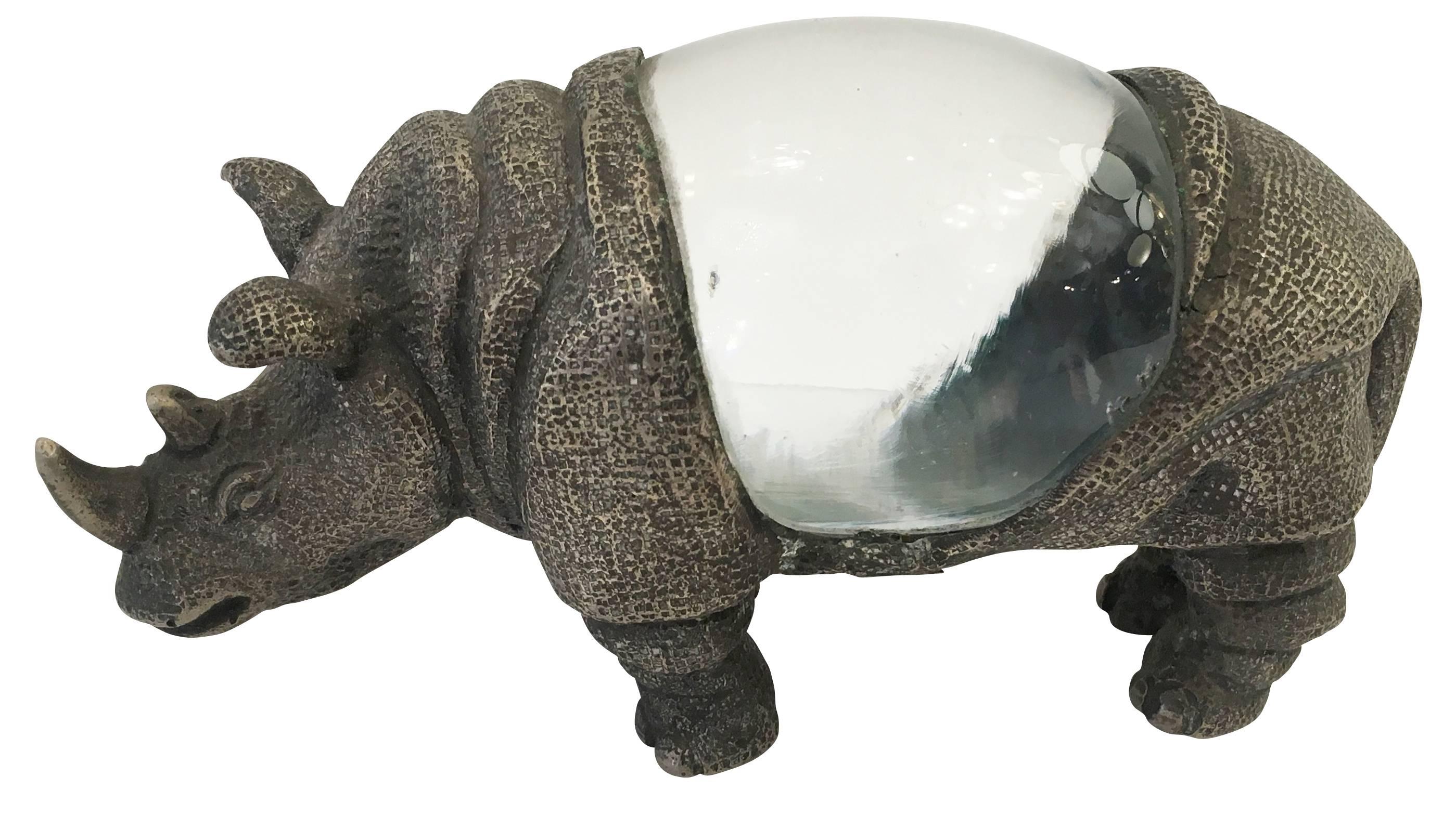 Wonderfully detailed silvered bronze rhino sculpture by Gabriella Crespi from the 1970s. The central body is composed of a Murano glass egg. Signed on the bottom.

Measures: Width 6”

Depth 2.5”

Height 3.25”.
