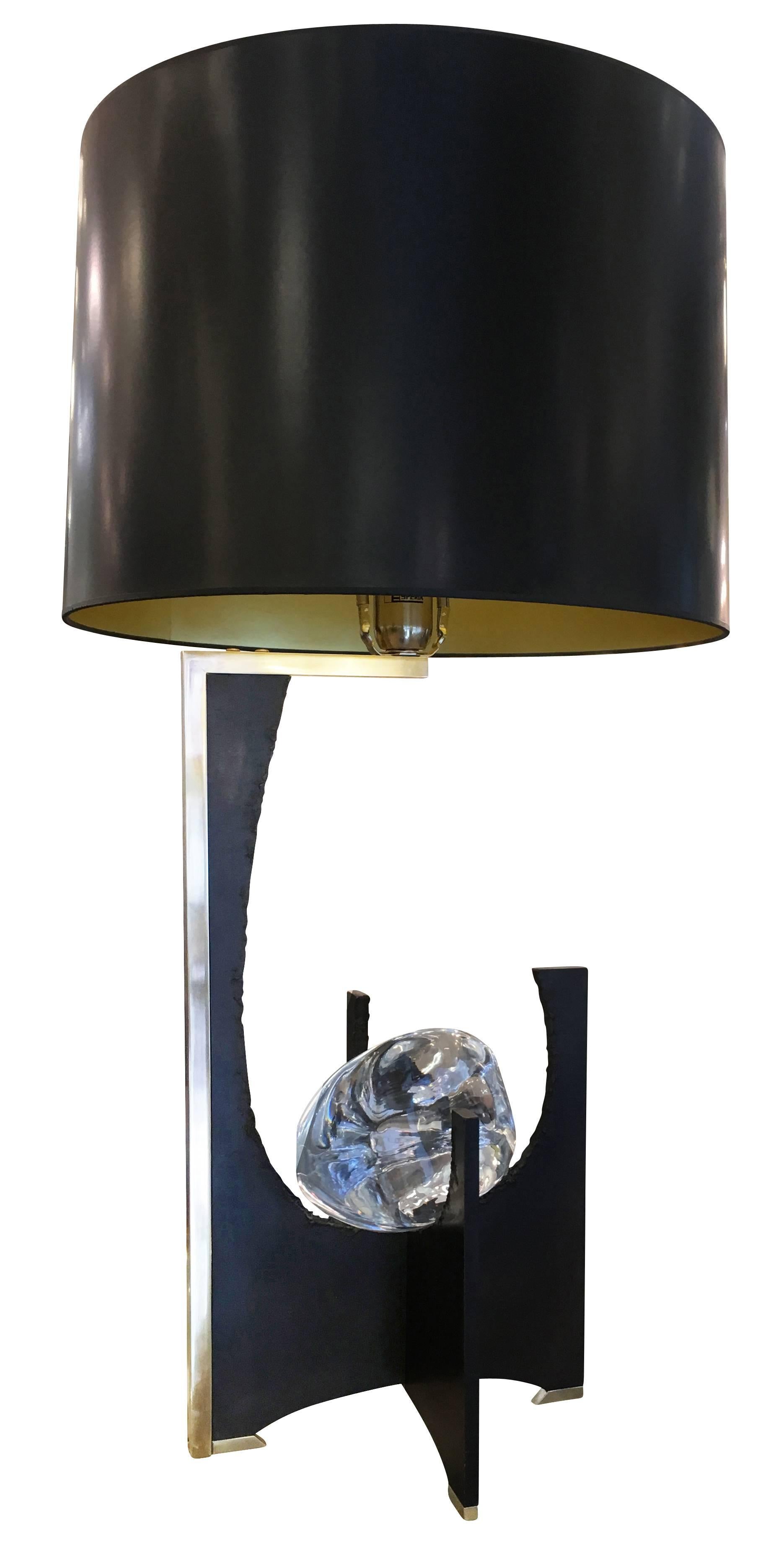 Large table lamp featuring a black iron base with brass details. At the centre is an organic handmade glass amber. Made by Esperia for Gaspare Asaro. Shade not included.

Measures: Width 11”

Depth 11.75”

Height 34” with shade.
