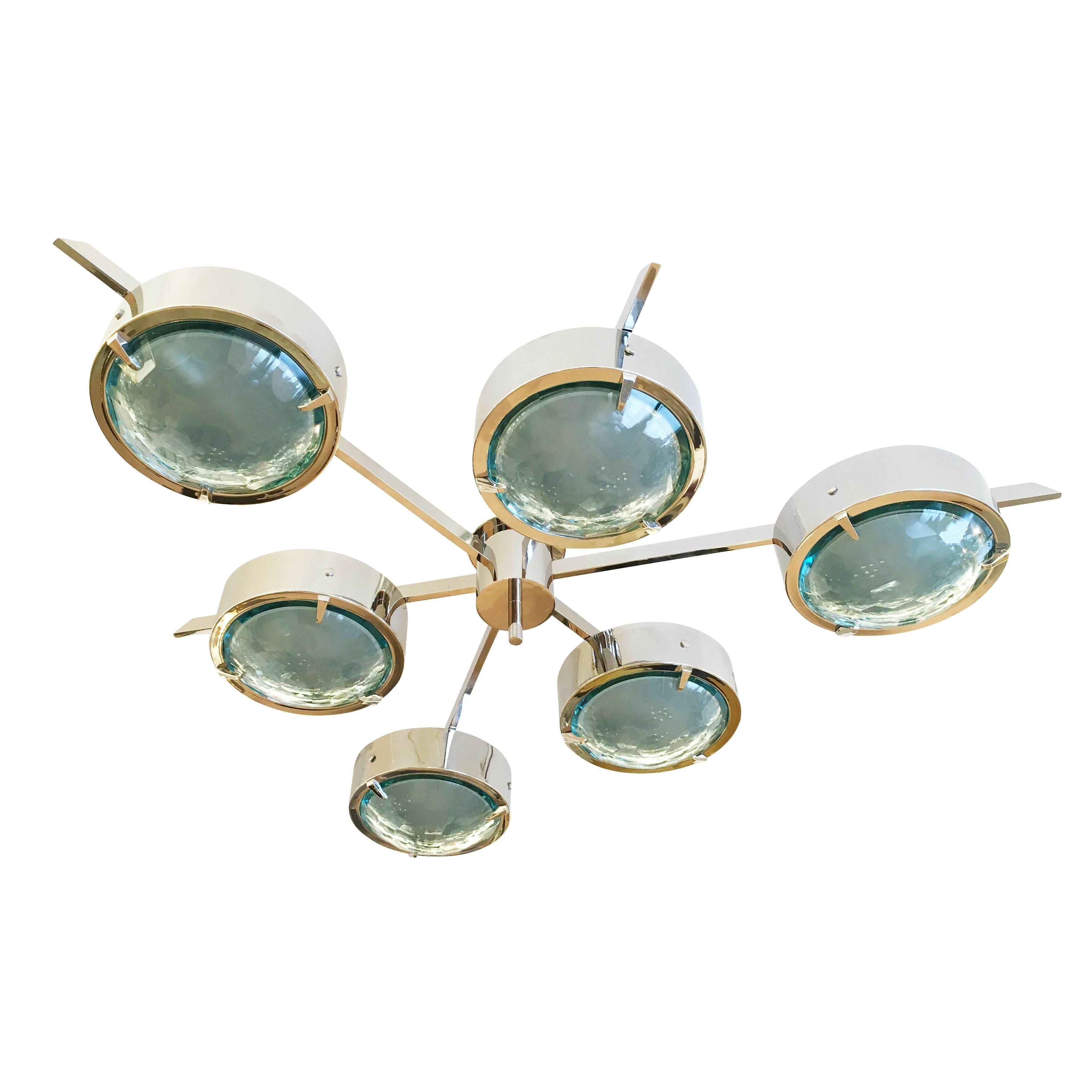 Stunning flush mount chandelier designed in collaboration with Italian Artist Fedele Papagni. It features six disks with green faceted glass bottoms on a nickel frame. The glass is frosted on the inside providing a soft diffused light. Can be