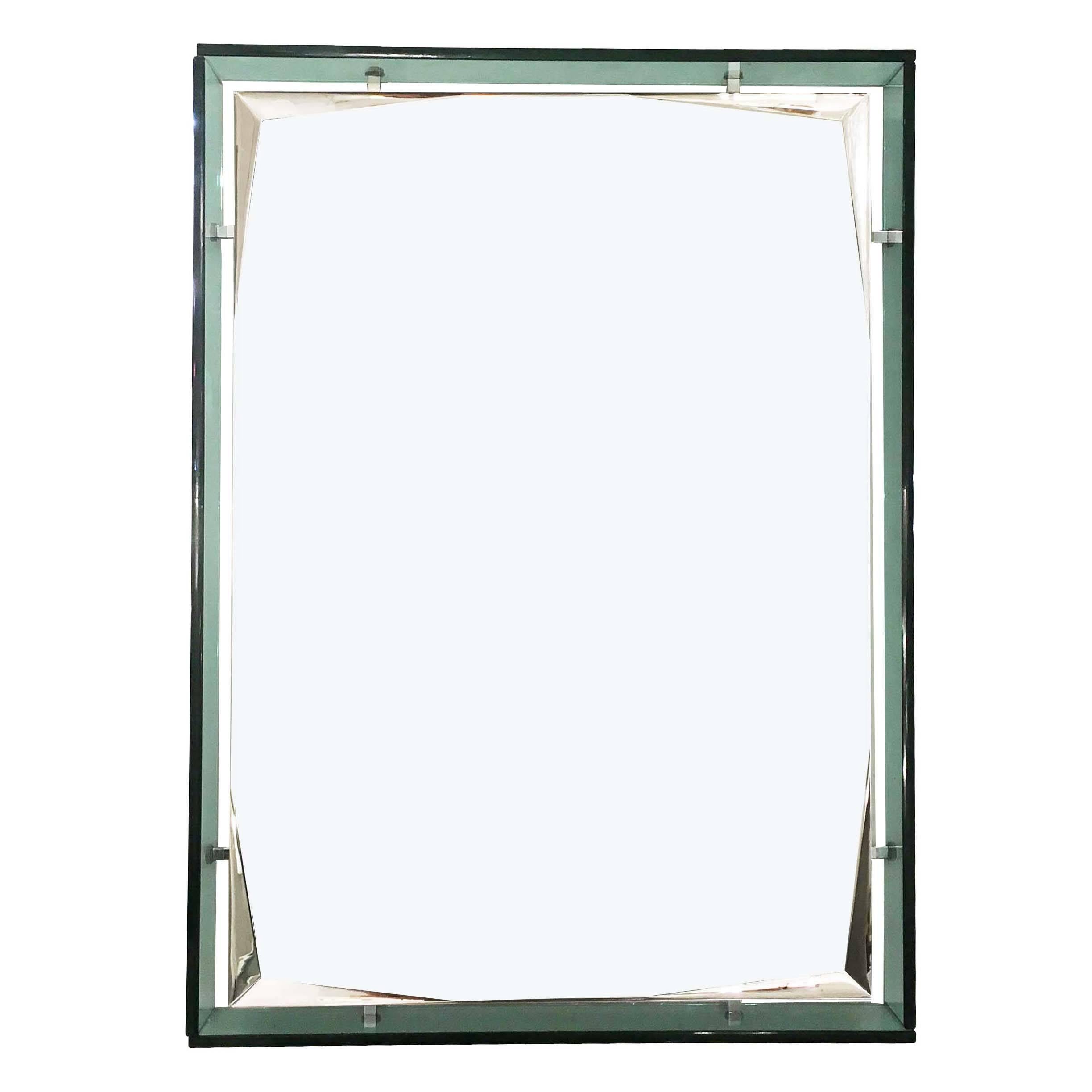 Turquoise mirror by Cristal Arte from the 1960s. The colored rectangular frame holds the mirrored section suspended via eight nickel-plated spacers. Small details like the internally etched corners of the mirror elevate the piece.

Condition: