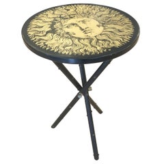 Tavolino Fornasetti con motivo "Sole", Italia, anni '60