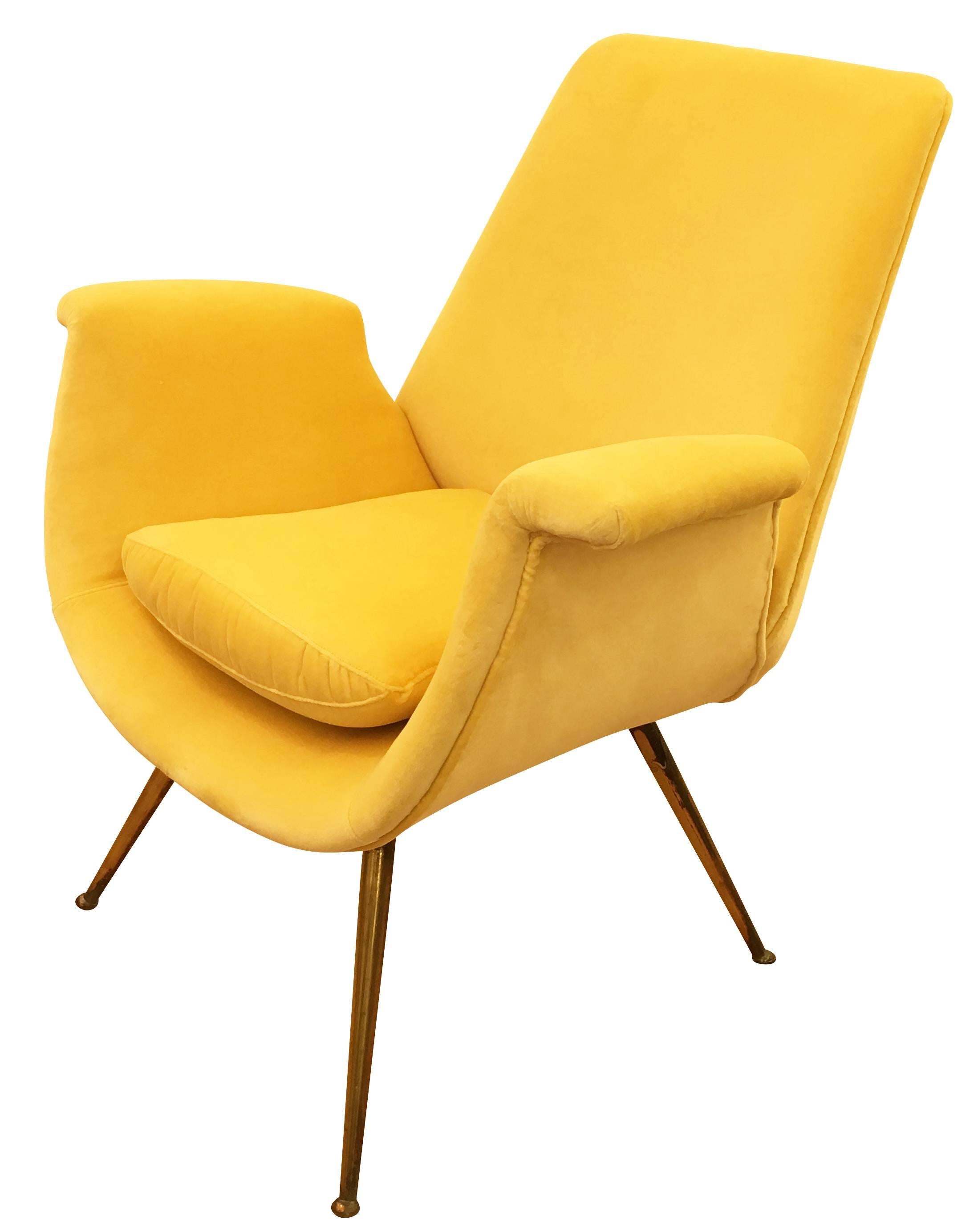 Pair of Italian midcentury armchairs upholstered in a canary yellow velvet. The legs are brass.

Condition: Excellent vintage condition, minor wear consistent with age and use. Legs have some tarnish but can be polished at no additional