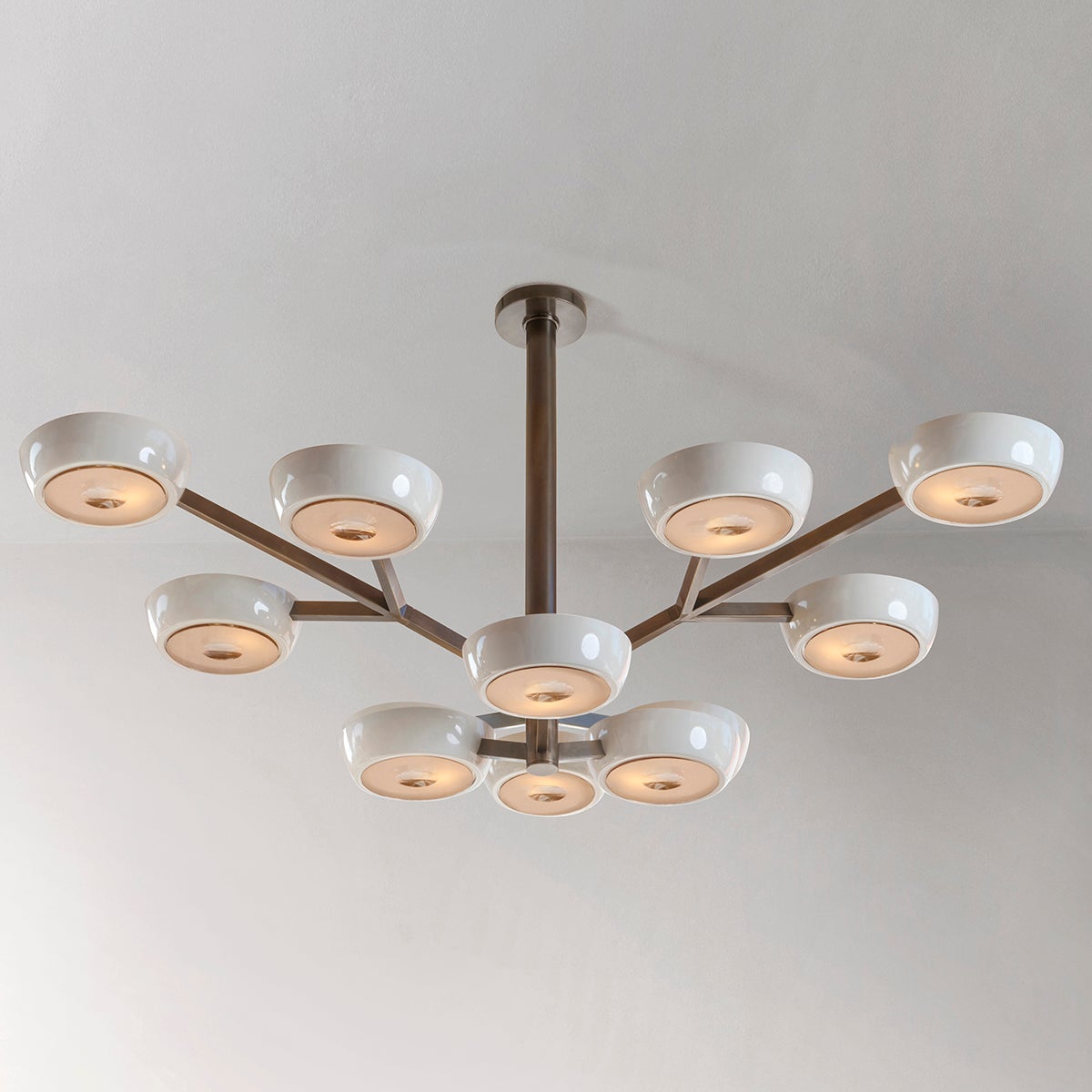 The Rose Grande ceiling light is distinguished by its branching two-tiered frame ending with clean and modern shades. With the option to customize the color of the shades, the finish of the metal and the type of glass, the Rose Grande is one of our