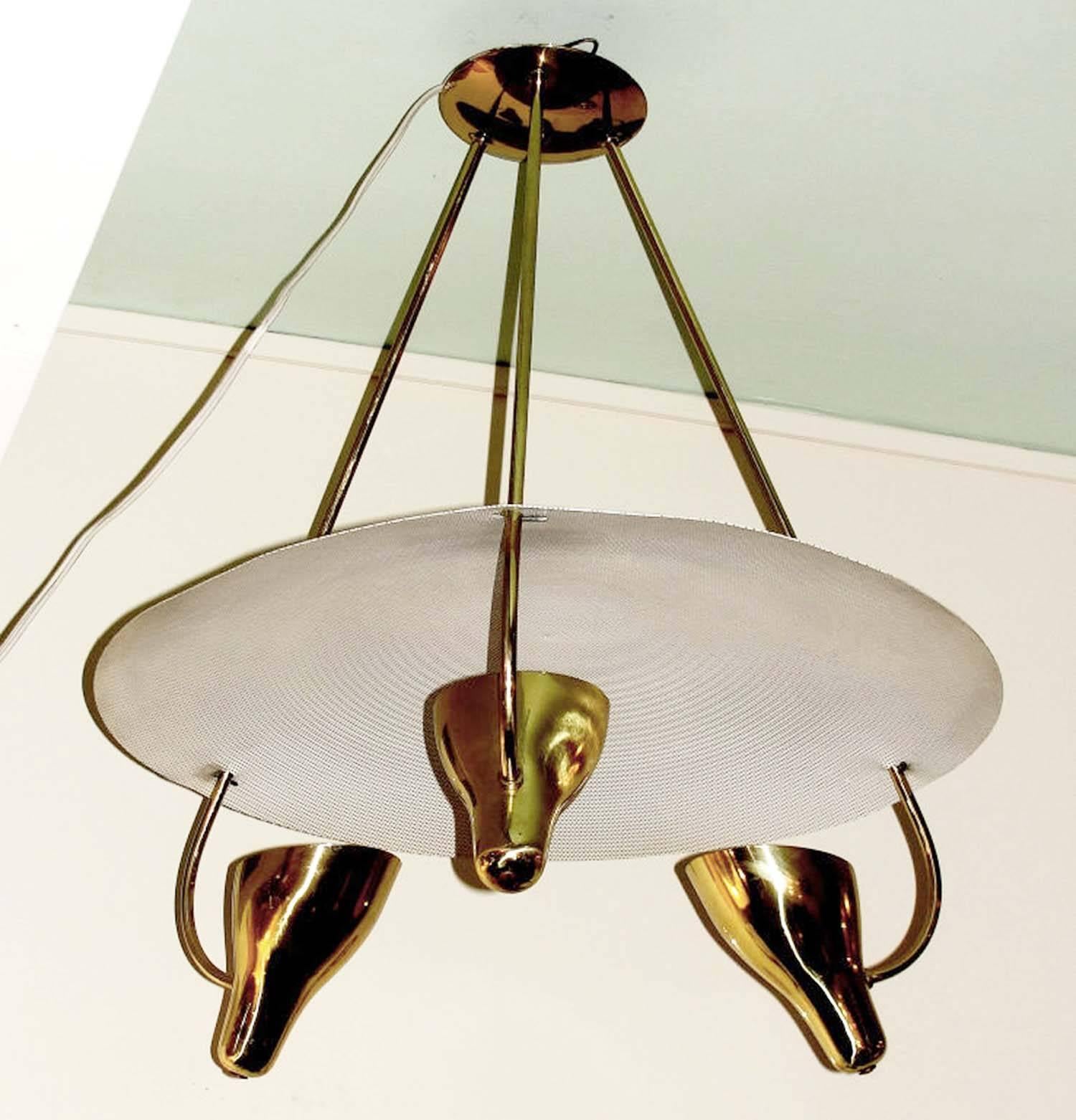 Sleek saucer shaped three light chandelier by Lightolier . Three brass stems come out from a perforated, concave white shade meant to diffuse the light projected from three brass cups. Holds three regular light sockets.