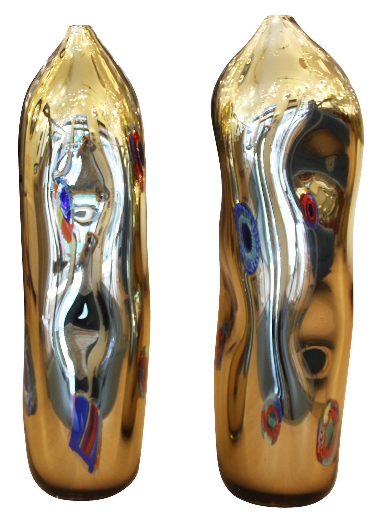 Decorative Murano vases by master glassblower Dona'. They have been formed to have an extraordinary 