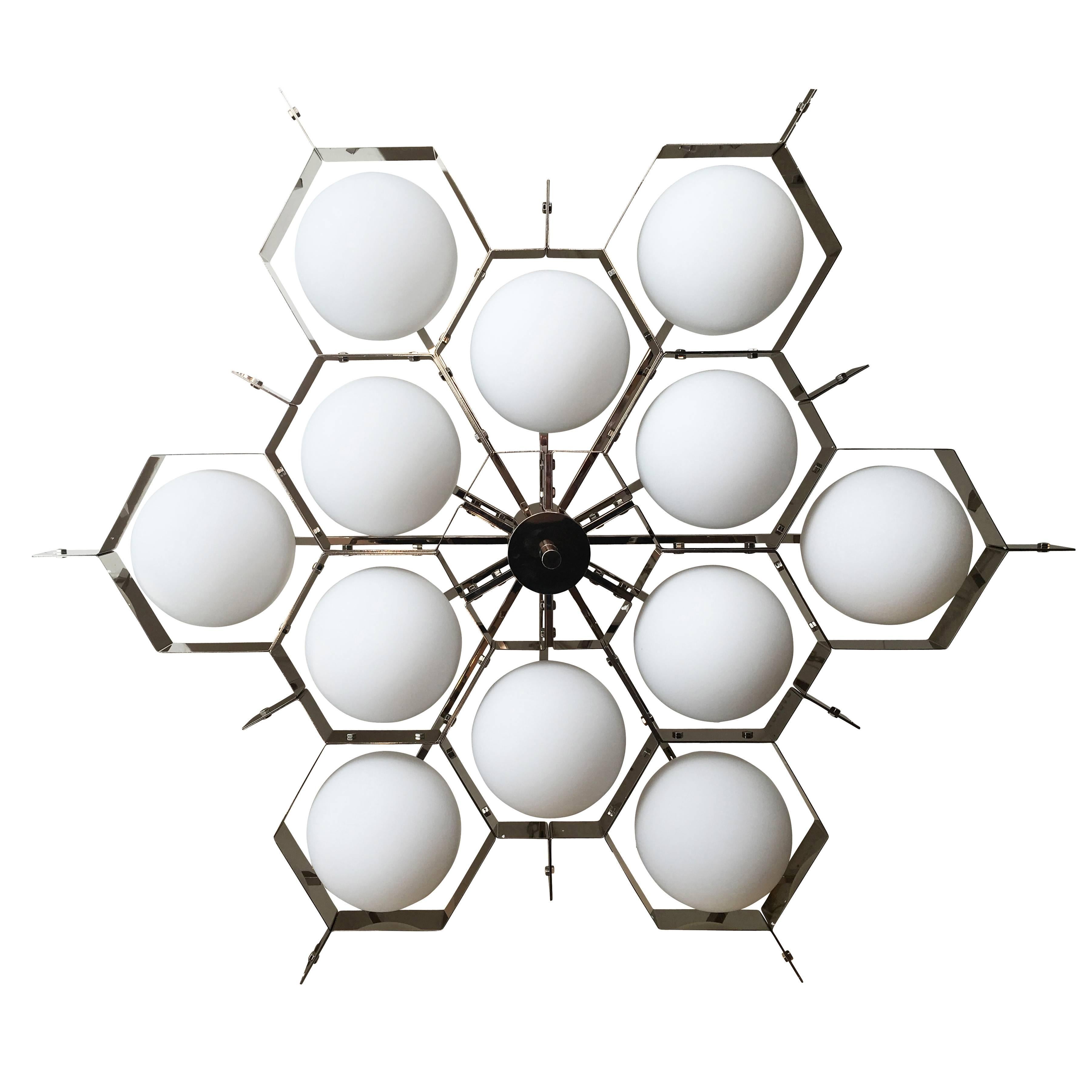 Large flush mount fixture with twelve glass spheres encased in a bee hive-like structure. Made in limited quantities exclusively for Gaspare Asaro-Italian Modern. Available in nickel, brass and other finishes on order. 
